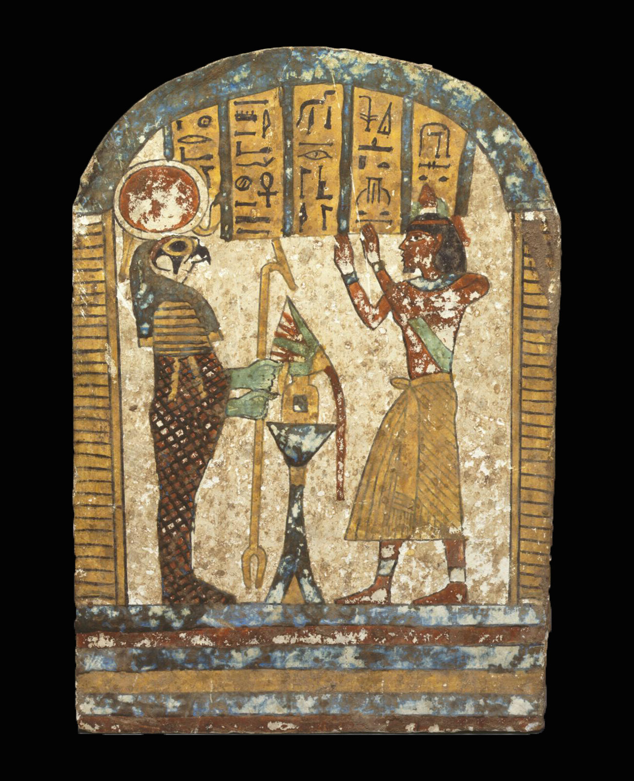 Figure 2.&nbsp;The falcon-headed sun god Re is adored by the priest Diefankh (UPMAA E2044). Image courtesy of the Penn Museum.