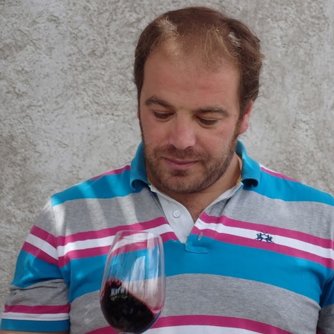 Pablo Martorell, Winemaker taste testing some of the wine. Vina Andrico vineyard in Mendoza, Argentina. 
