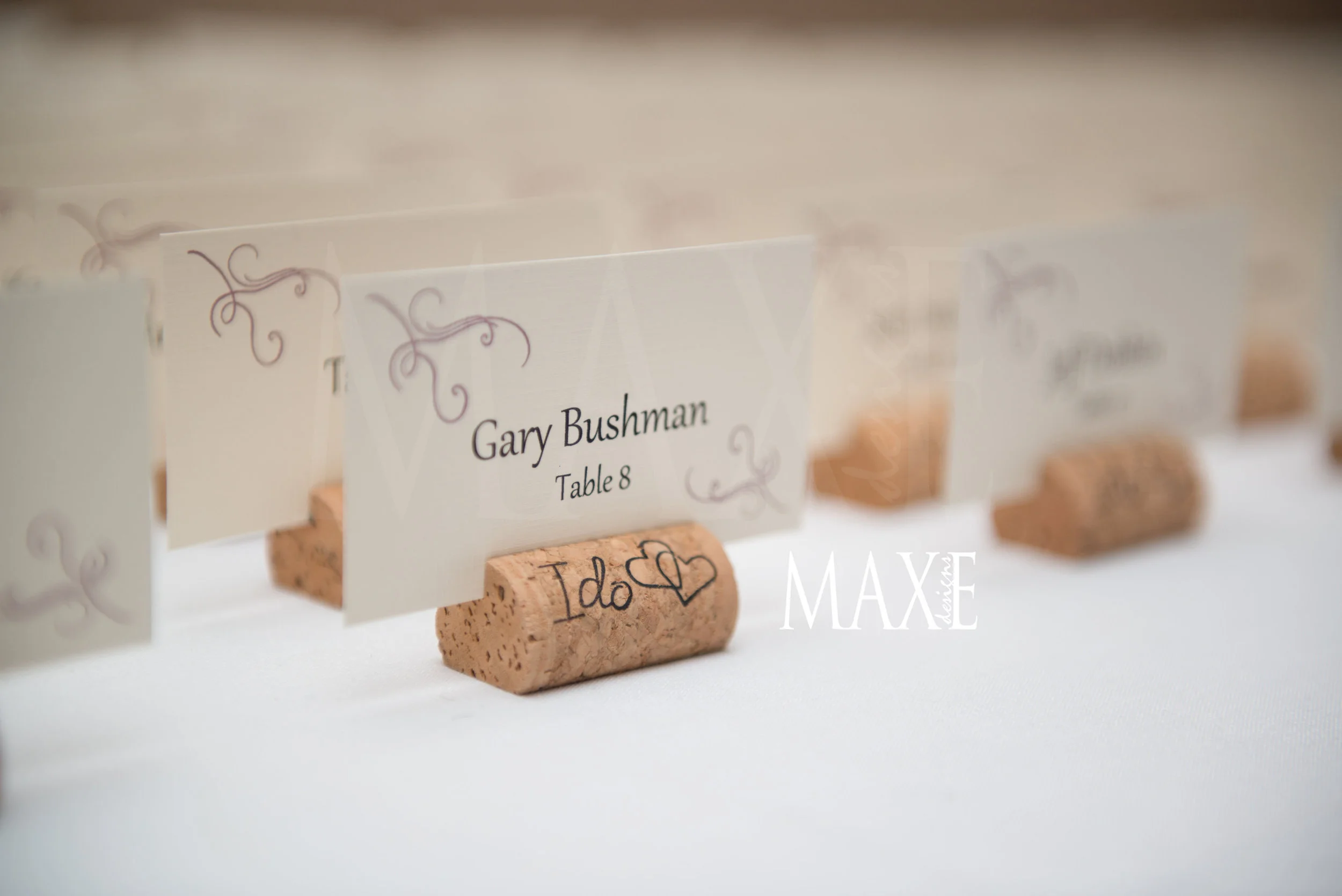 Samantha & Nick's wine cork escort card favors were a hit!