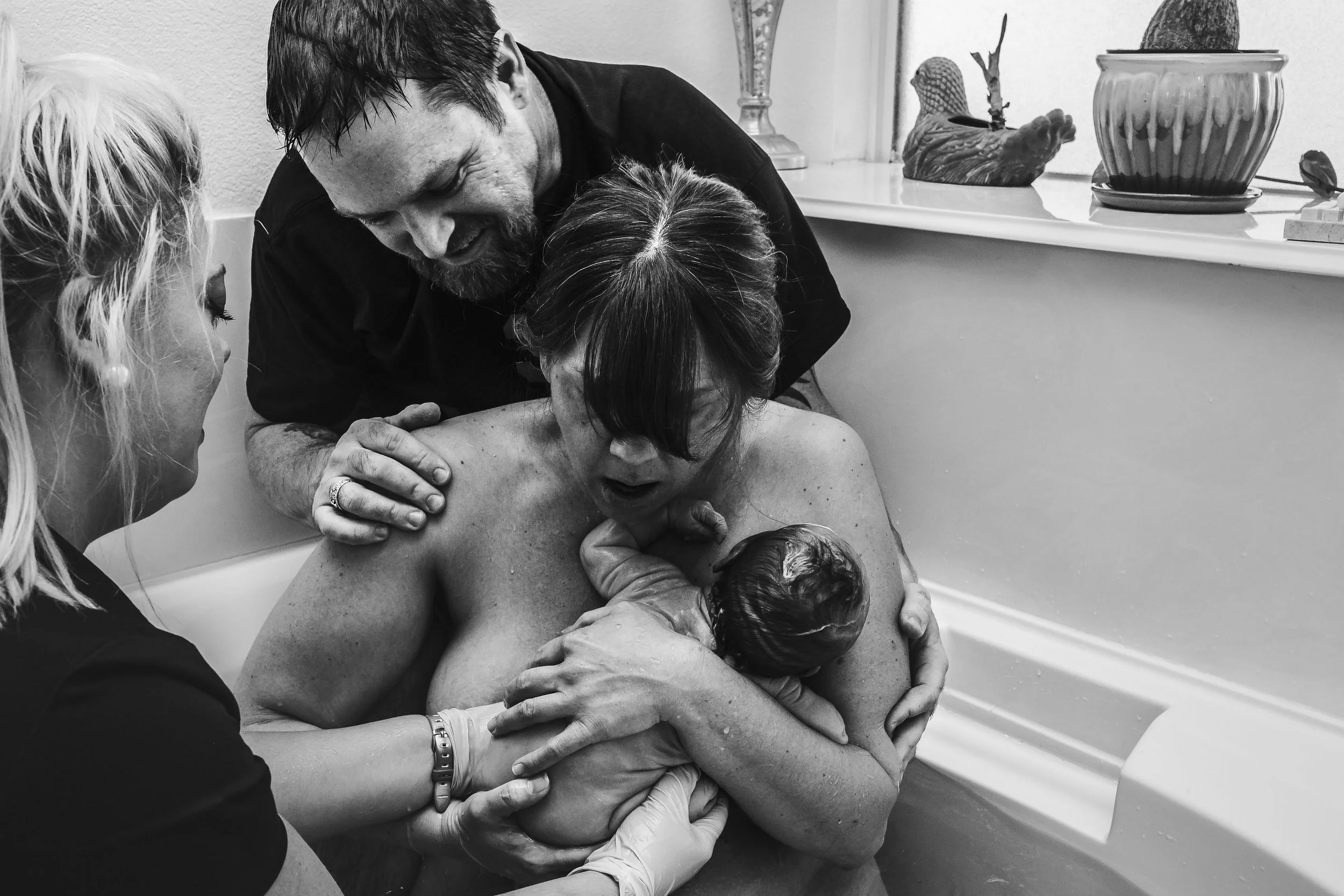 home birth that went from first contraction to baby in less then as hour.  Dallas / Fort Worth birth photographer, KEDocumentary 