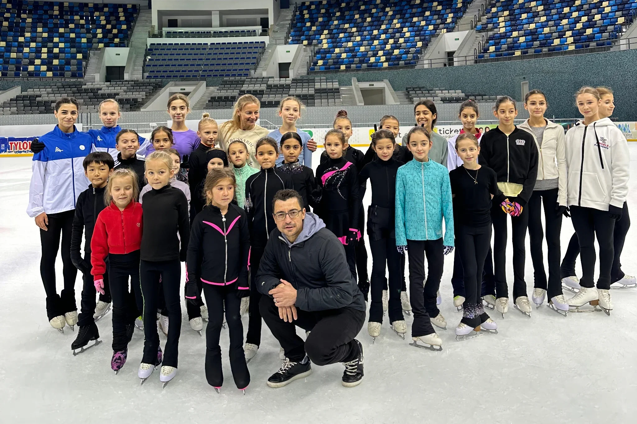 Group figure skating class on the ice at Krigor Studio, NJ