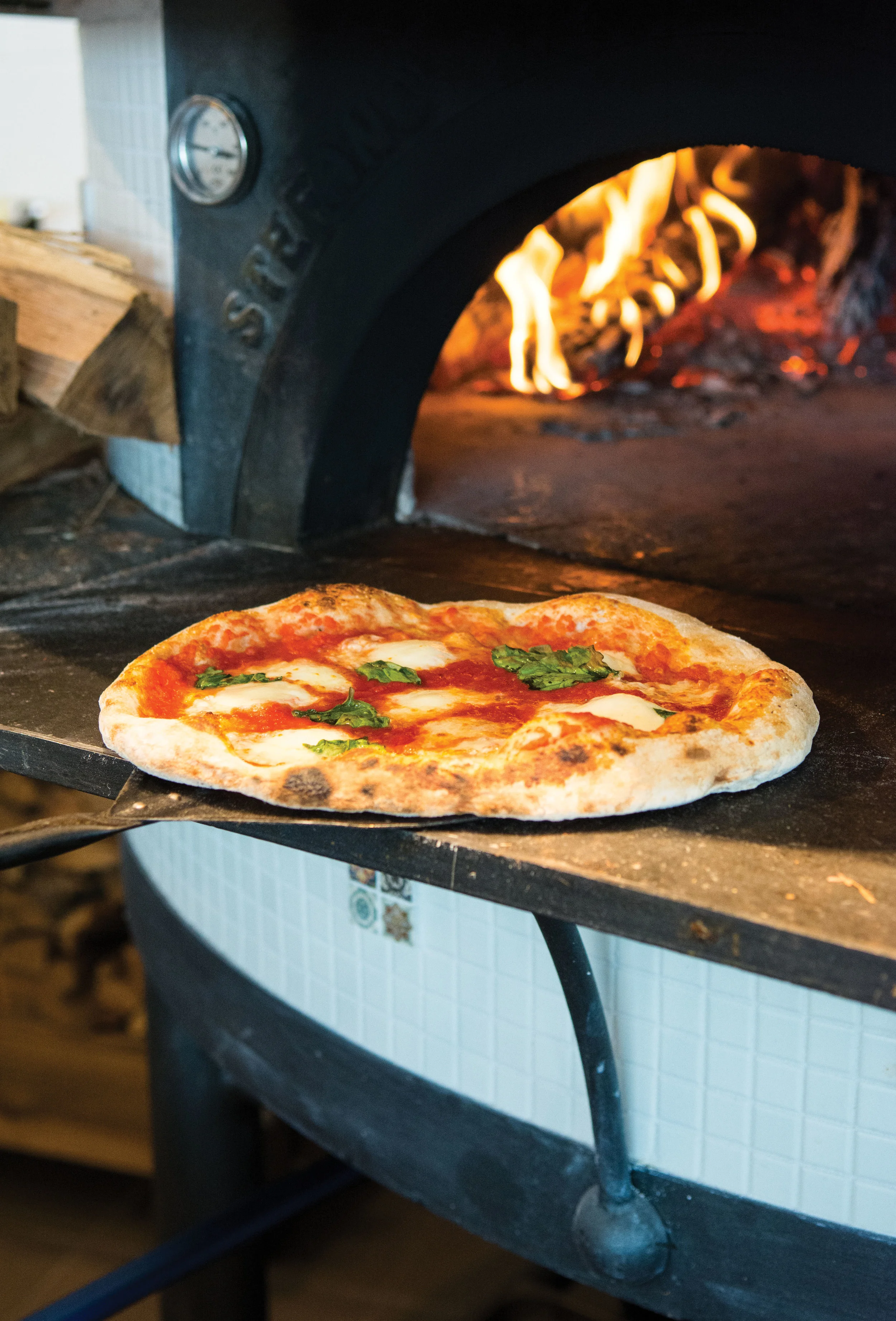 best new restaurant: pizzeria faulisi photo by ginny williams photography