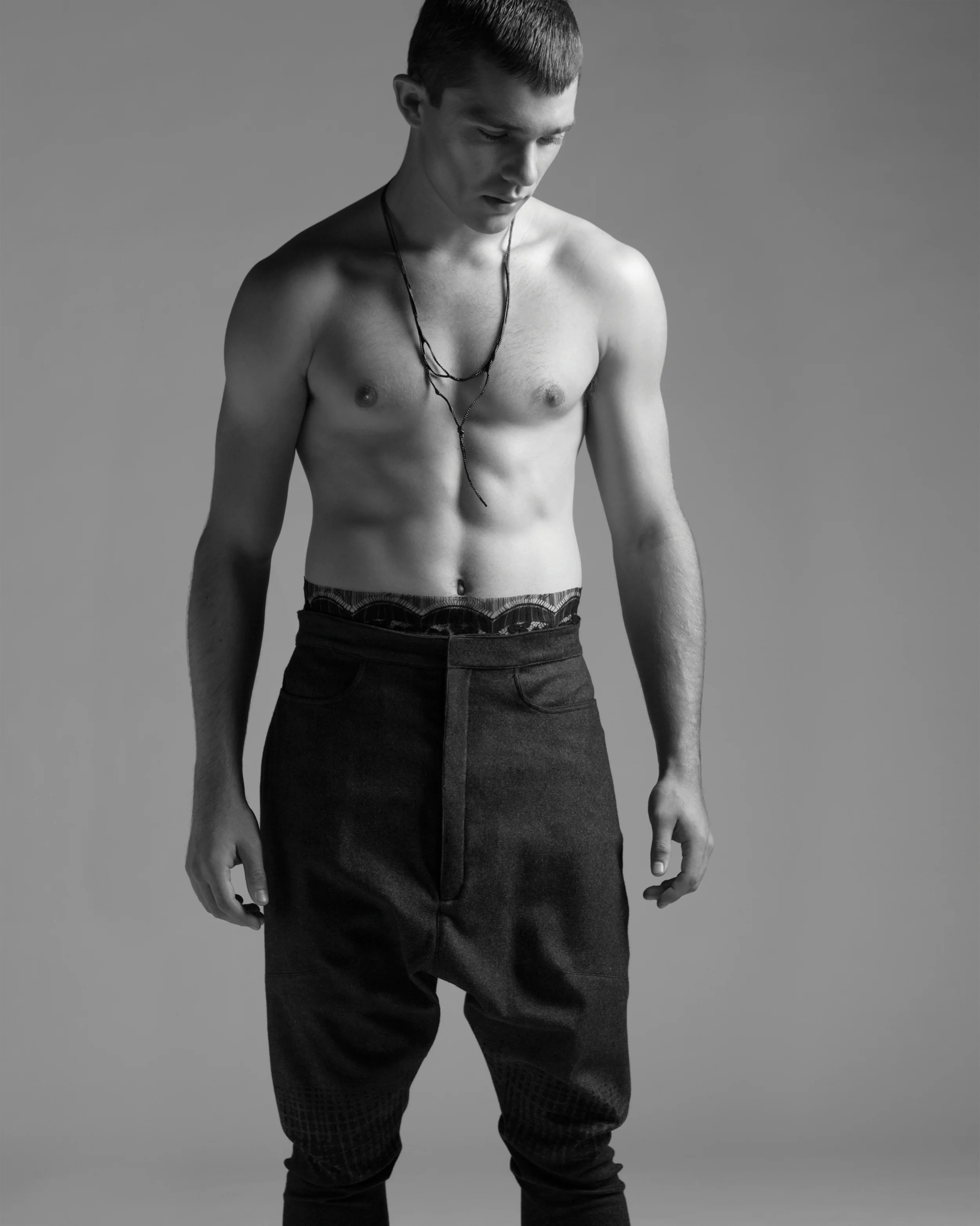 Pants by Frank Tsai, MFA Fashion Design and Andrea Nieto, BFA Textile Design. Necklace by Blacken. Cummerbund, stylist's own. 