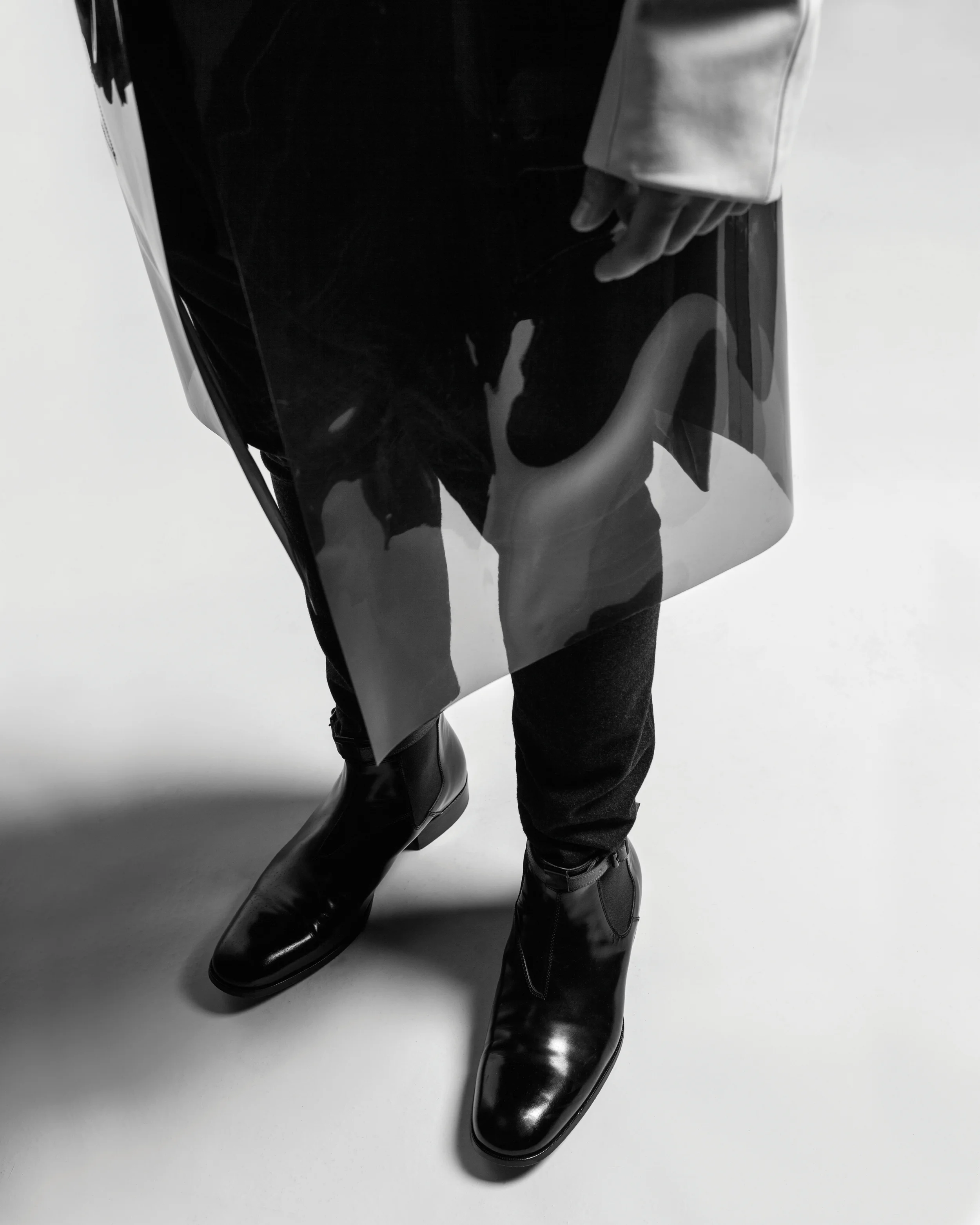 Coat by Ran Bi, BFA Fashion Design. Pants by Frank Tsai, MFA Fashion Design and Andrea Nieto, BFA Textile Design. Boots by Alexander McQueen. 