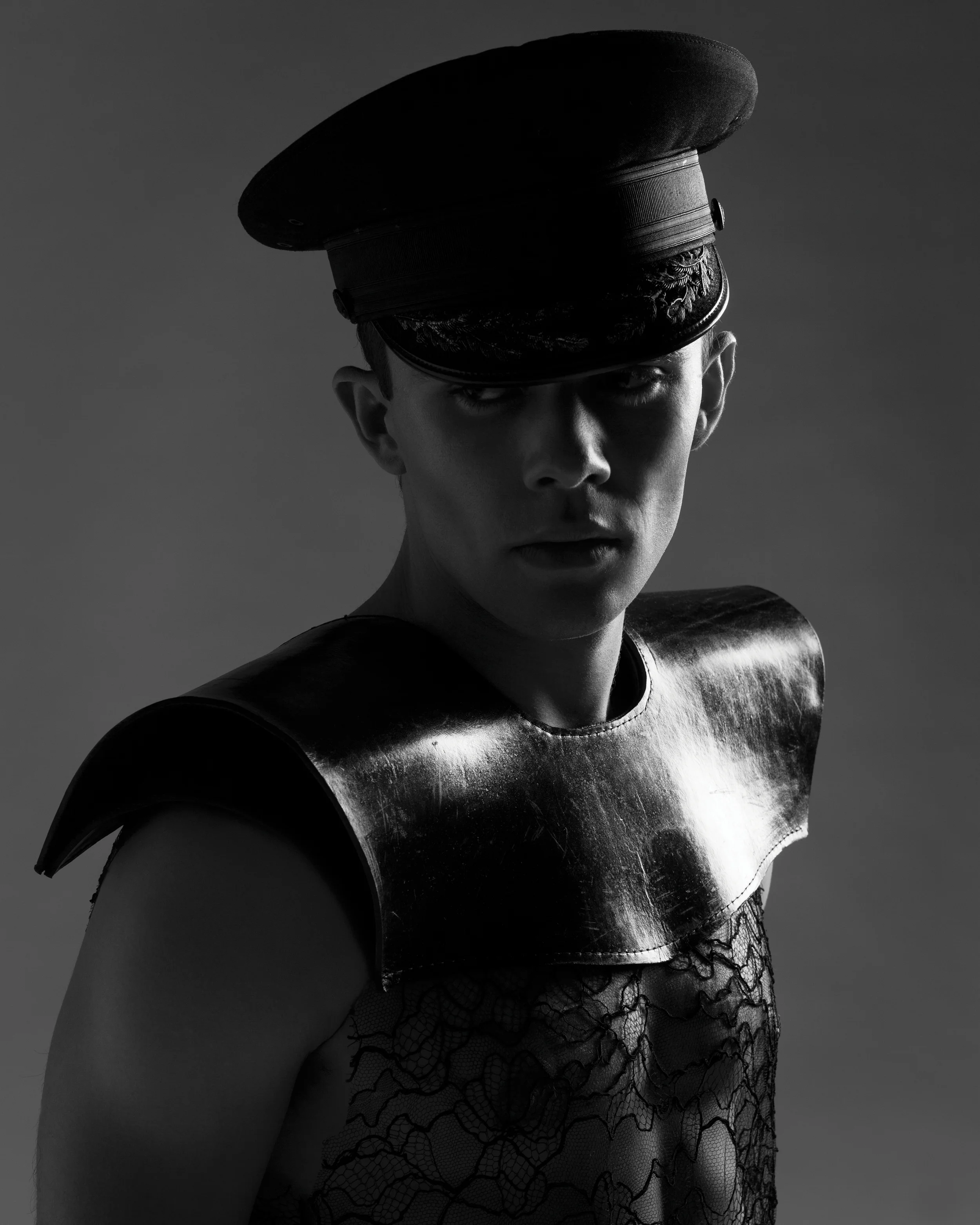 Leather shoulders by Oshrat Ben-Issac, BFA Fashion Design. Sophie Hallette lace tank, stylist's own. Hat, stylist's own. 