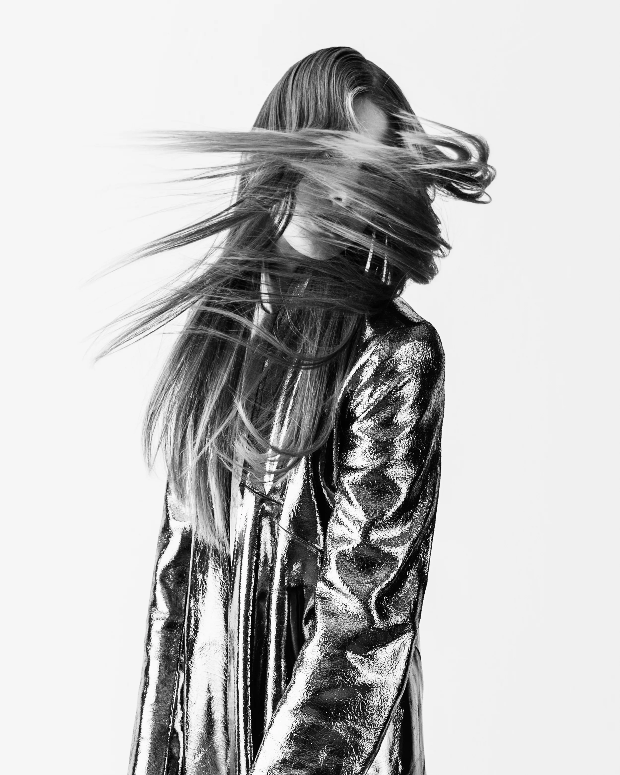 Coat by Andre Torija, BFA Fashion Design. Dress by Jason Tam, MFA Fashion Design. 