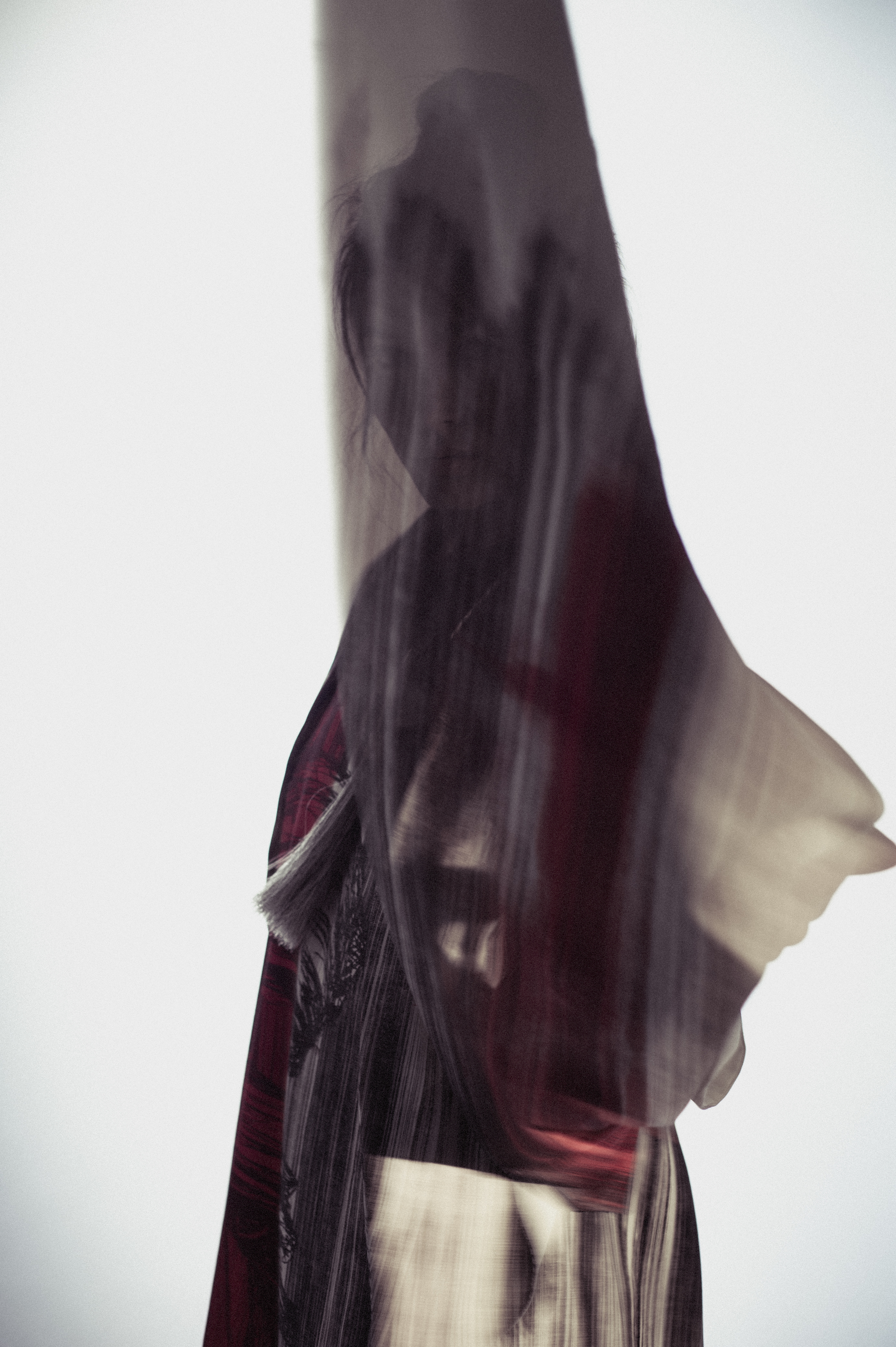 Printed dress by Flora Cervantes, MFA Fashion Design and Lori Solem, MFA Textile Design. Horsehair and leather necklace by Elizabeth Prost, BFA Fashion Design. 