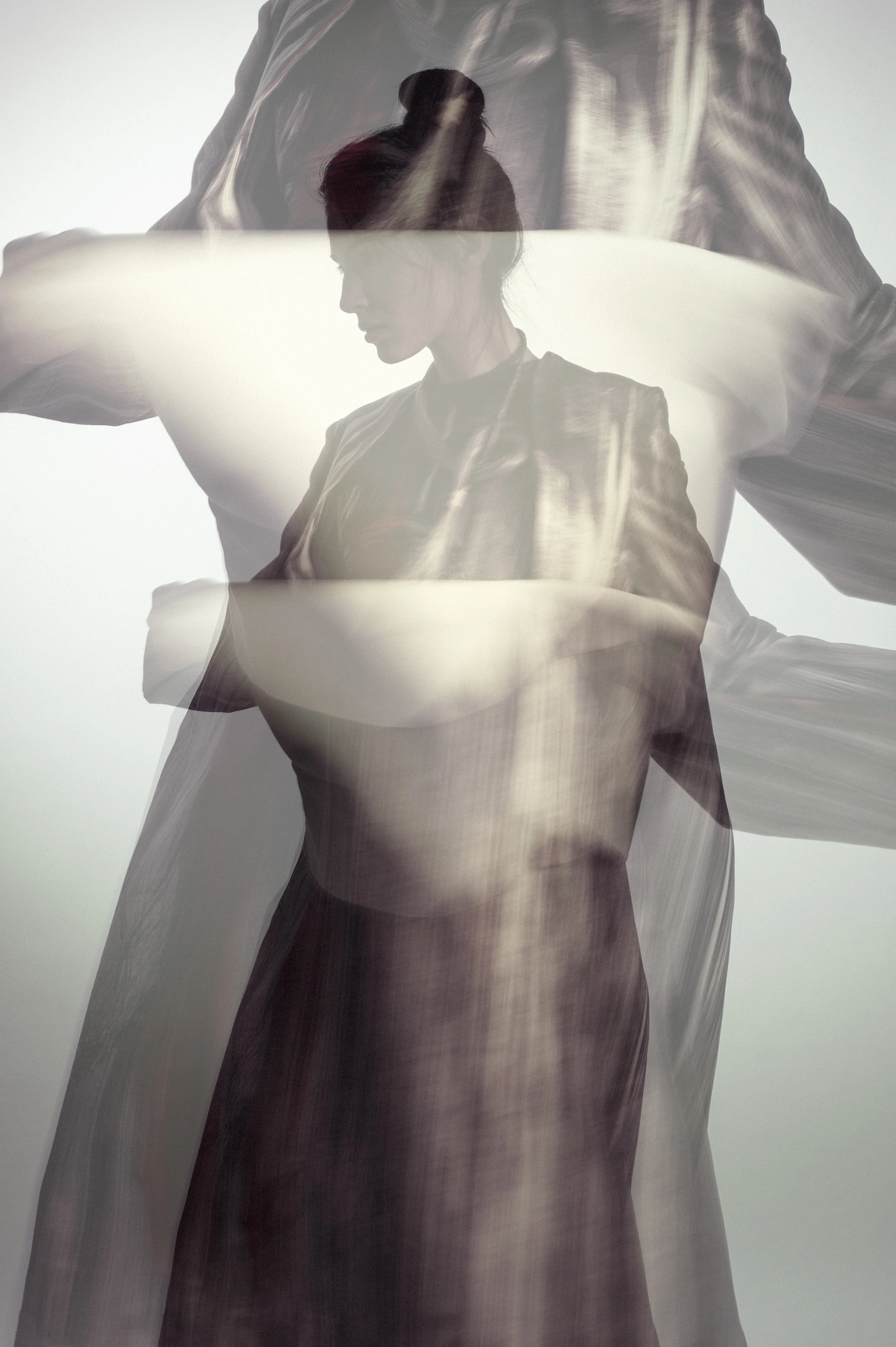 Printed dress by Flora Cervantes, MFA Fashion Design and Lori Solem, MFA Textile Design. Horsehair and leather necklace by Elizabeth Prost, BFA Fashion Design. 