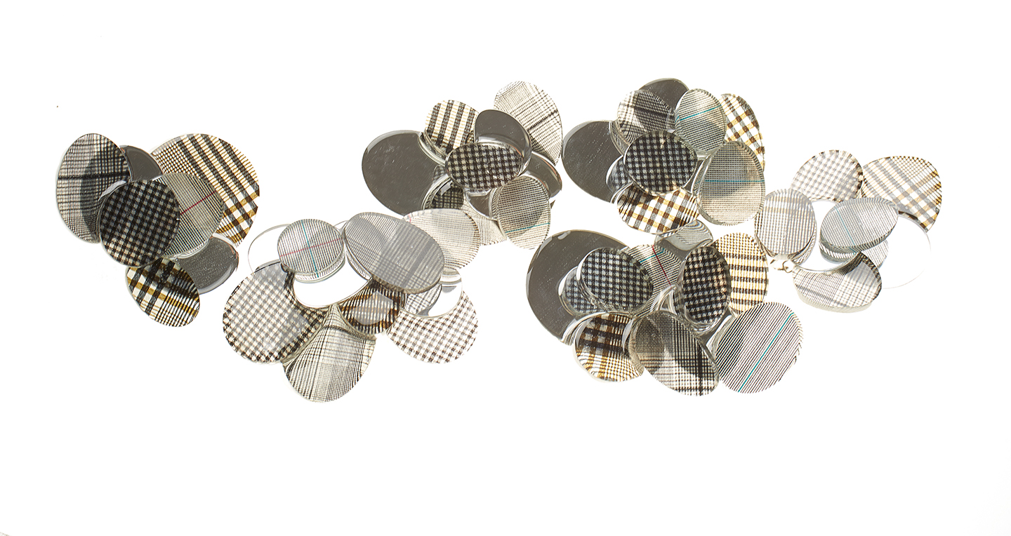 Brooches and rings by Wavy Yucen Tang, MFA Jewelry & Metal Arts. 