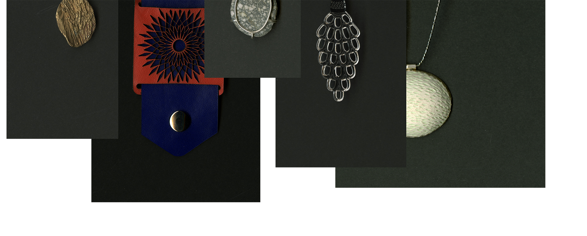 from left to right: Bronze cast pendant by Deanna Wardley, MFA Jewelry & Metal Arts. Laser-cut leather cuff by Ariella Greenfield, BFA Photography. River rock pendant by Deanna Wardley, MFA Jewlery & Metal Arts. Mritika laser-cut pendant by Nandini Misra, MFA Fashion Design. Ceramic dome pendant by Deanna Wardley, MFA Jewelry & Metal Arts. 