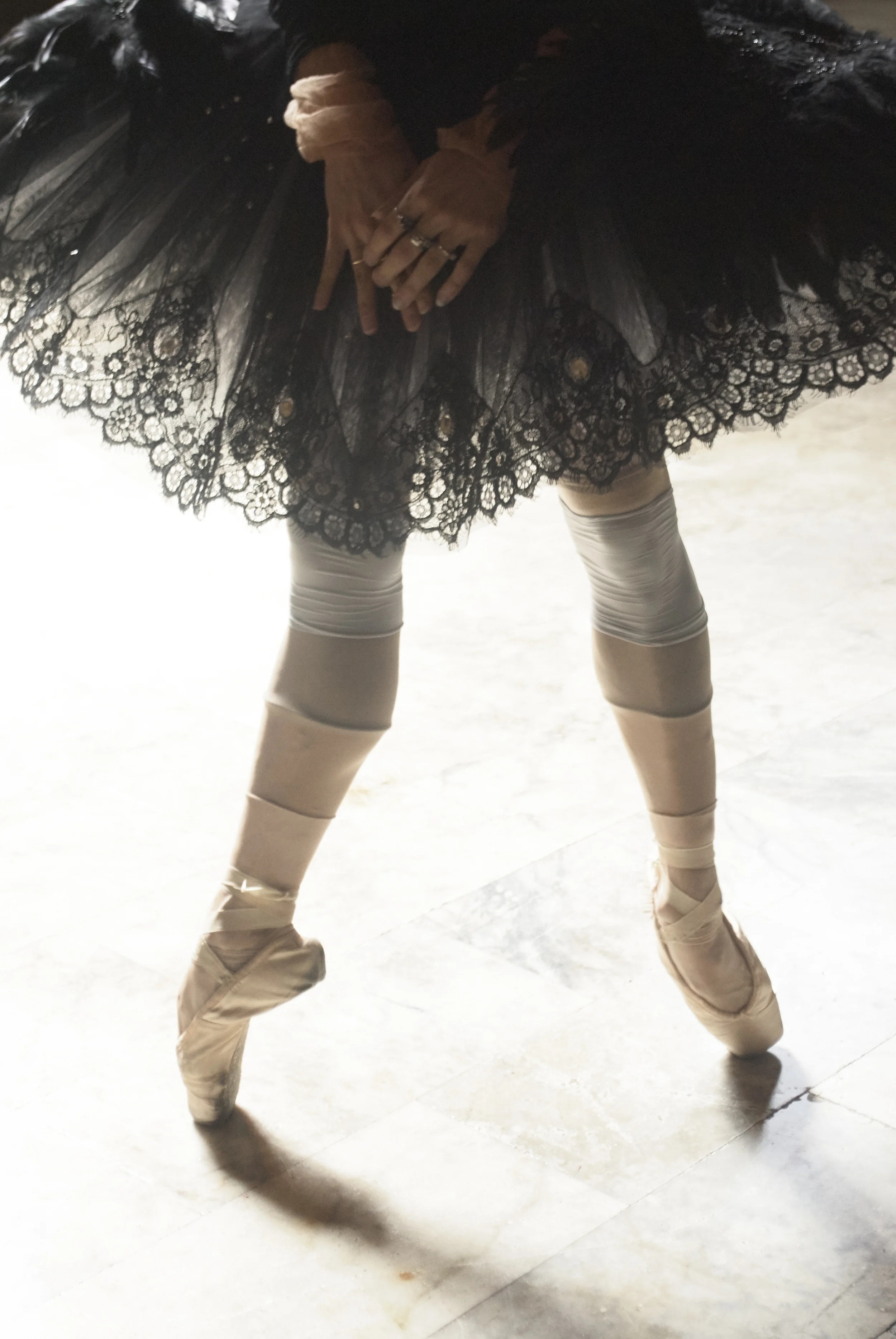 Tutu by Yi Li, BFA Fashion Design. Leotard and Pointe Shoes, model's own. All stockings, stylist's own. 