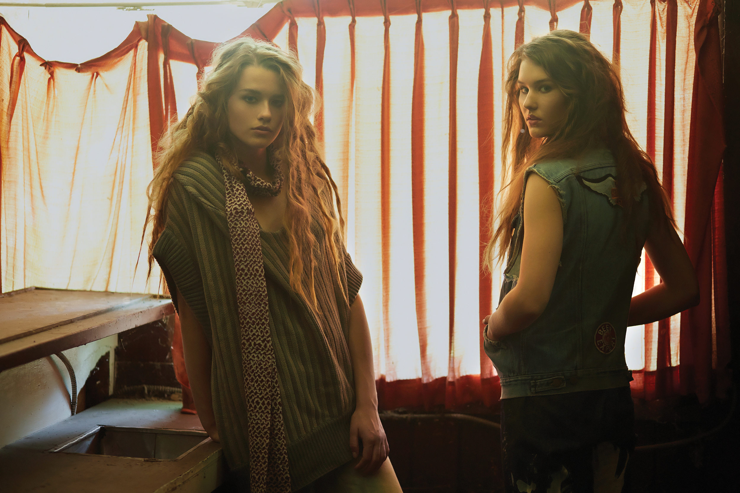 On Sofia: Sweater and Scarf by Stephanie Gelot, MFA Knitwear Design. Jeans, stylist's own. On Carly: Vest, Afterlife Vintage. Jeans by Xiaowei Liu, MFA Fashion Design. 