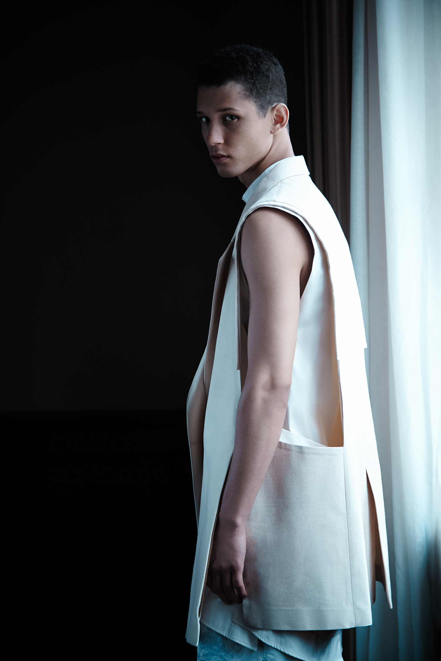 Sleeveless Jacket by Ruone Yan, BFA Menswear Design. Shirt by Dominic Tan, BFA Menswear Design. Shorts by Kevin C. Smith, MFA Menswear Design, and Andrea Nyberg, MFA Textile Design. 