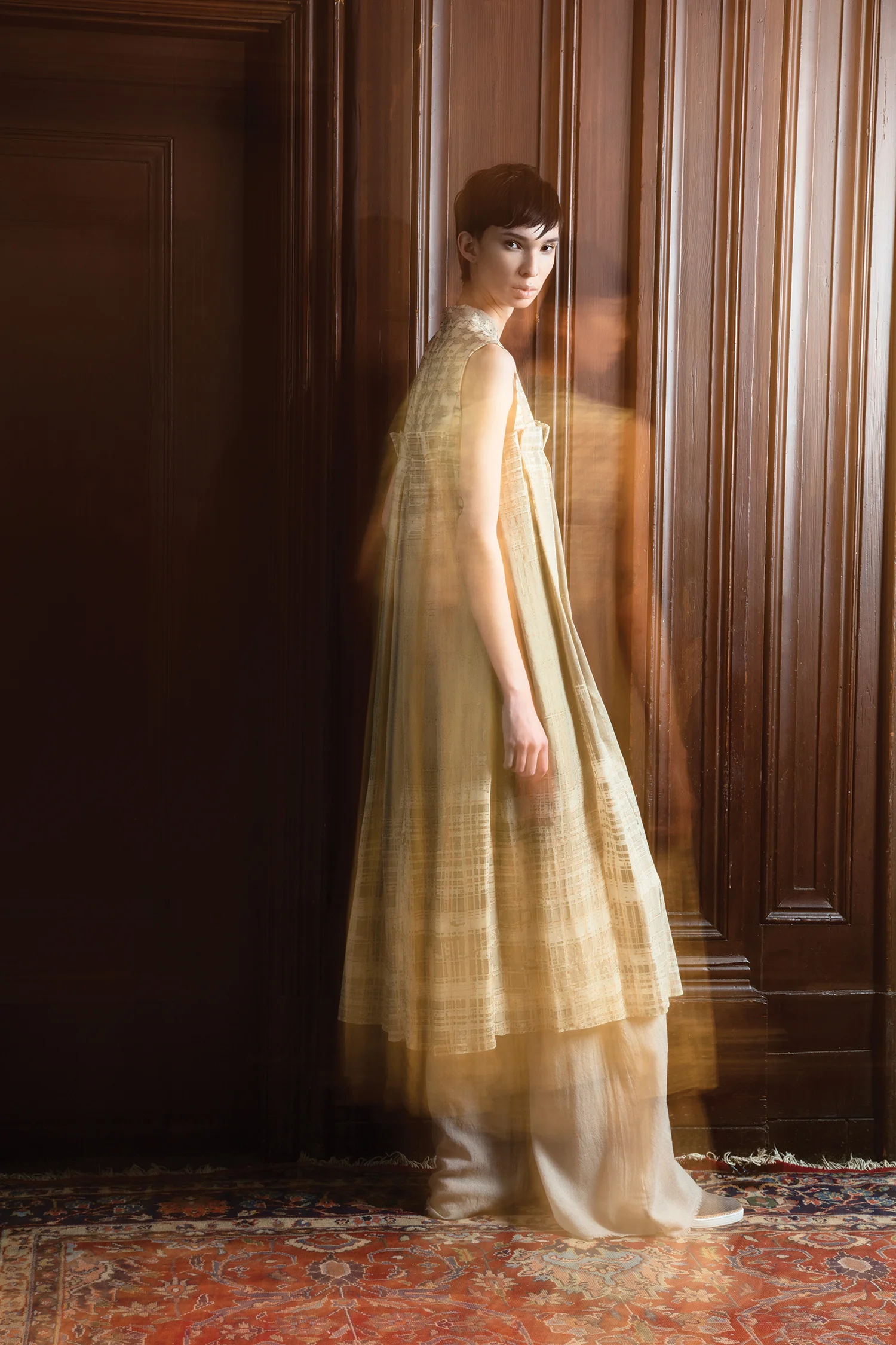 Dress by Dora Li, MFA Fashion Design. Pants by Lindsey Truman, MFA Fashion Design. Slip-on sneaker, UGG.
