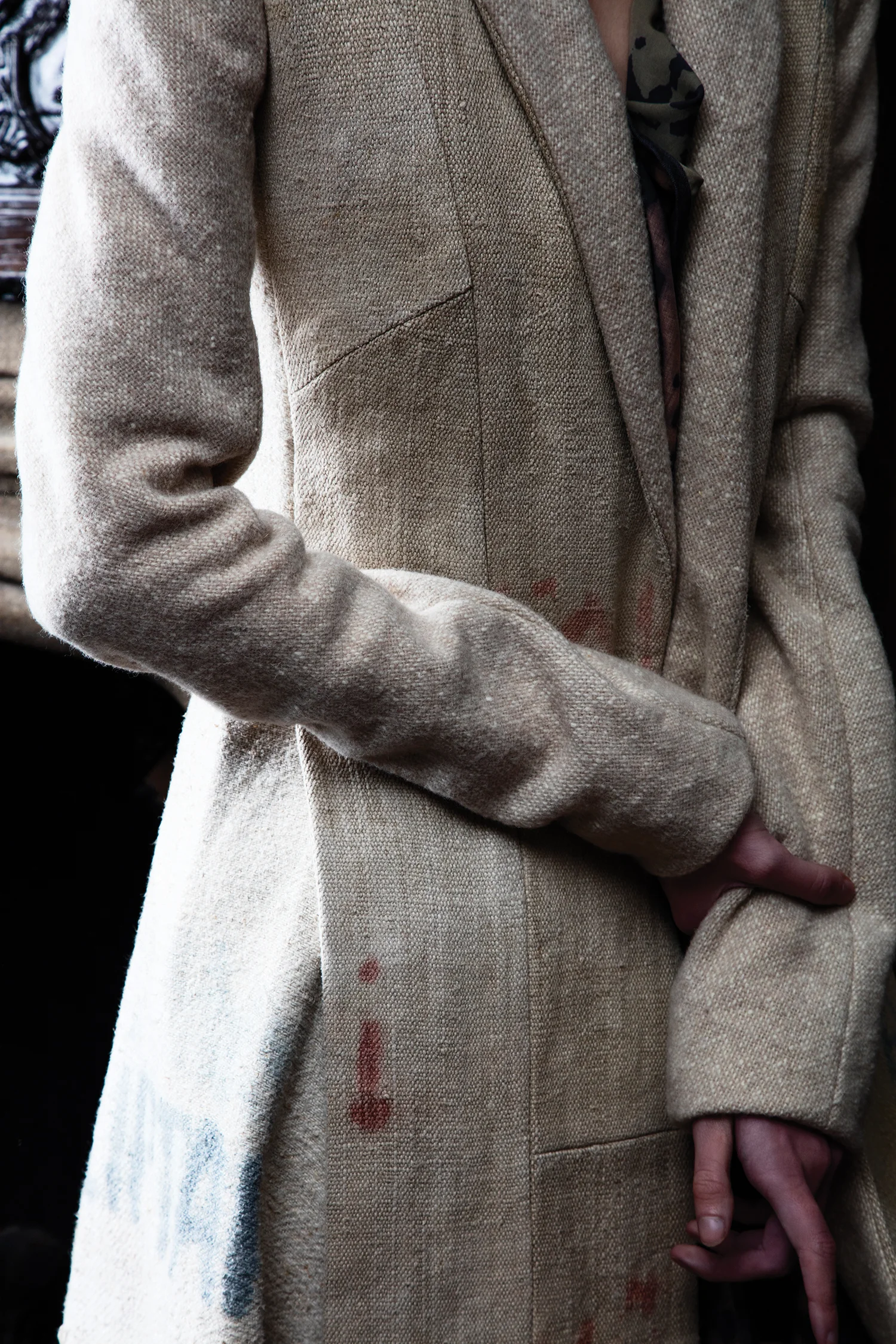 Coat by Lindsey Truman, MFA Fashion Design. Top by Justin Moreno, BFA Menswear Design.