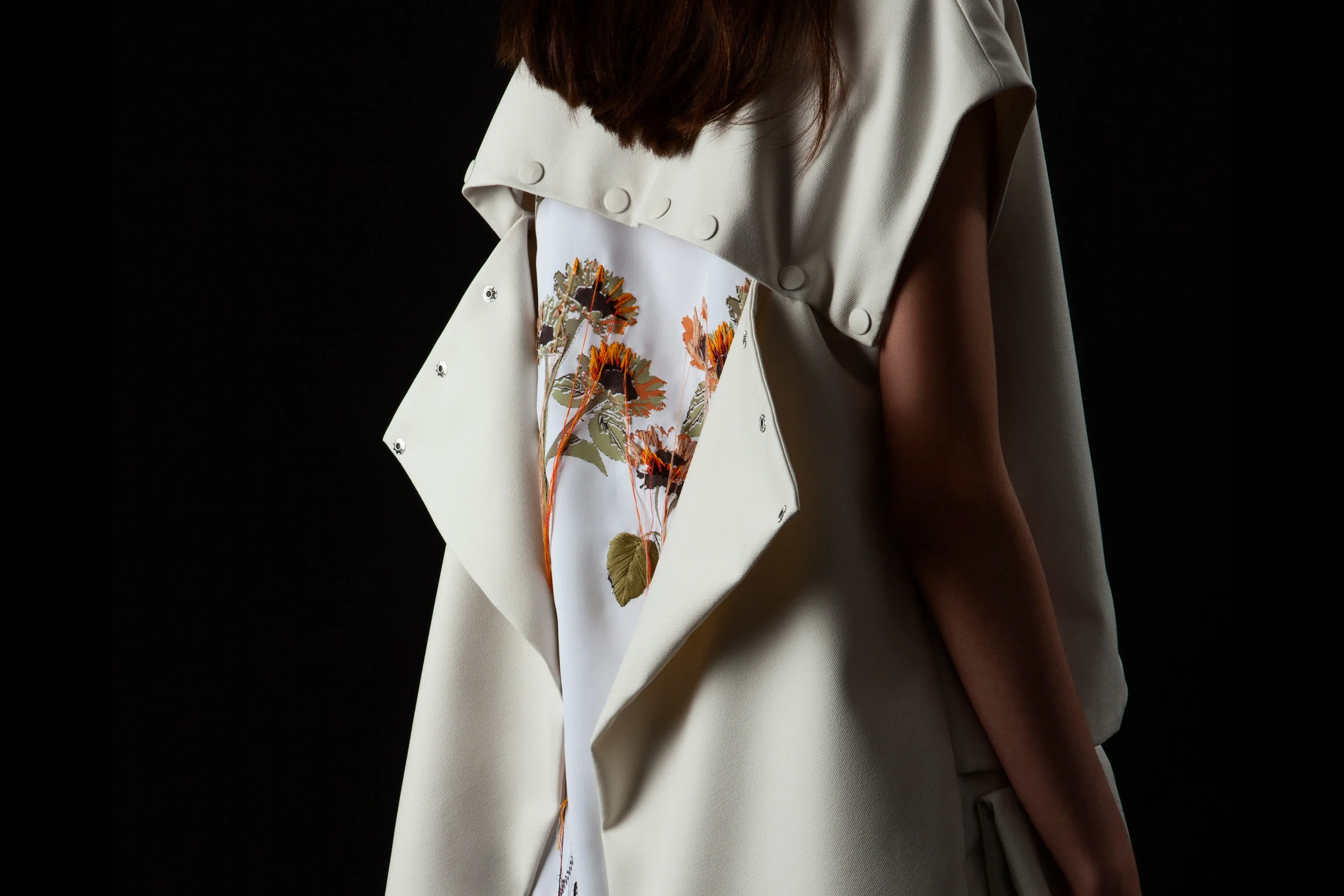Dina Marie Lam, MFA Fashion Design (womenswear and printed textiles), and Carlos Rodriguez, MFA Fashion Design (embroidery).