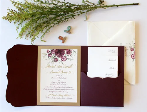 The Cascade Autumn florals tumble effortlessly from the top of this suite, setting a romantic tone. Colors in the flowers can be adjusted for Spring or Summer, and the pocketfold is available in any color. Suite shows with digital gold printing, and four enclosure cards. For events with less information to send to your guests, this design can be simplified as our Standard Suite.