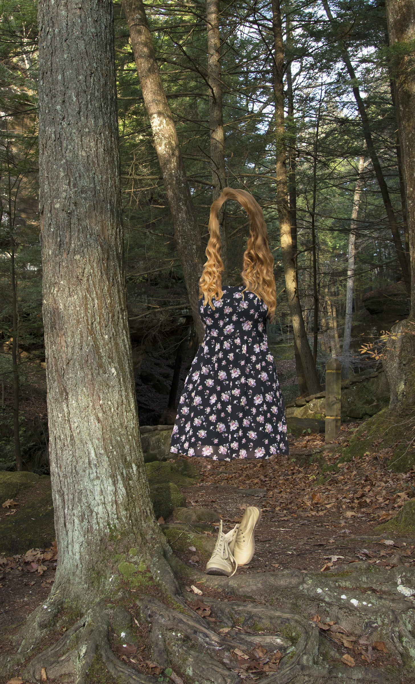 This is a self-portrait taken for a photography class assignment for Ohio University at Hocking Hills State Park in the fall of 2014.