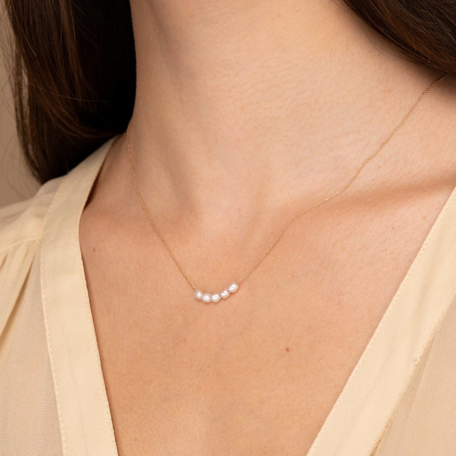 2019-08-12_CroissantDome-Product-Dainty_Organic_Pearl_Necklace-Close_Up.jpg