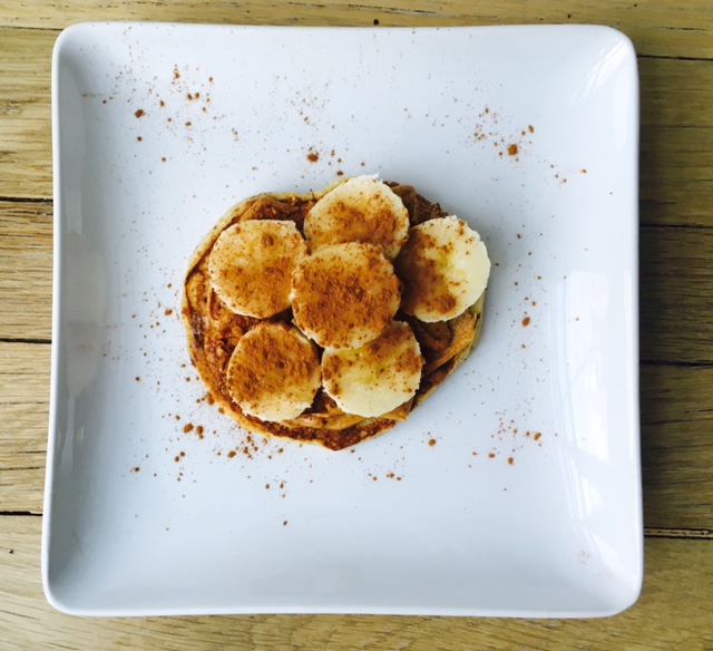 Almond, coconut pancake with cashew butter, honey, bananas and cinnamon. 
