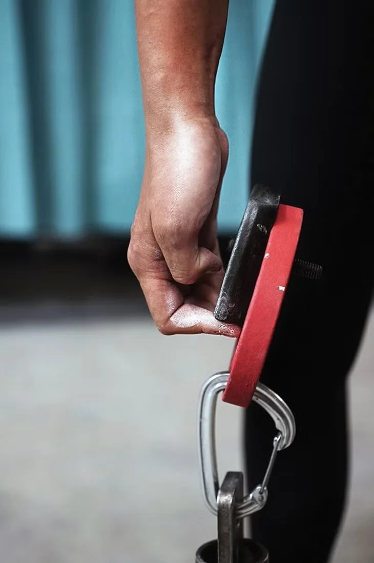While grip position may vary based on your goals, to protect against injury, train the half-crimp/semi-crimp position—without