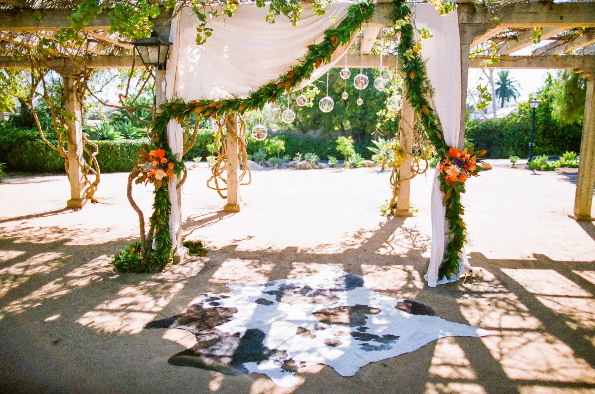 www.felicievents.com | Felici Events | Historical Museum Wedding | Eclectic Orange Wedding | Ceremony Altar Cowhide