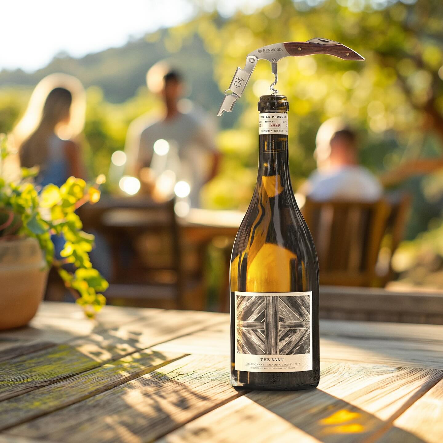 Spot the time traveler! (Swipe) ➡️

We used AI to give this bottle of @kenwoodvineyards The Barn Chardonnay a fresh look. We pulled the bottle from an image we captured in 2022 at their winery (photo 2) and composited it into a new lifestyle scene ge