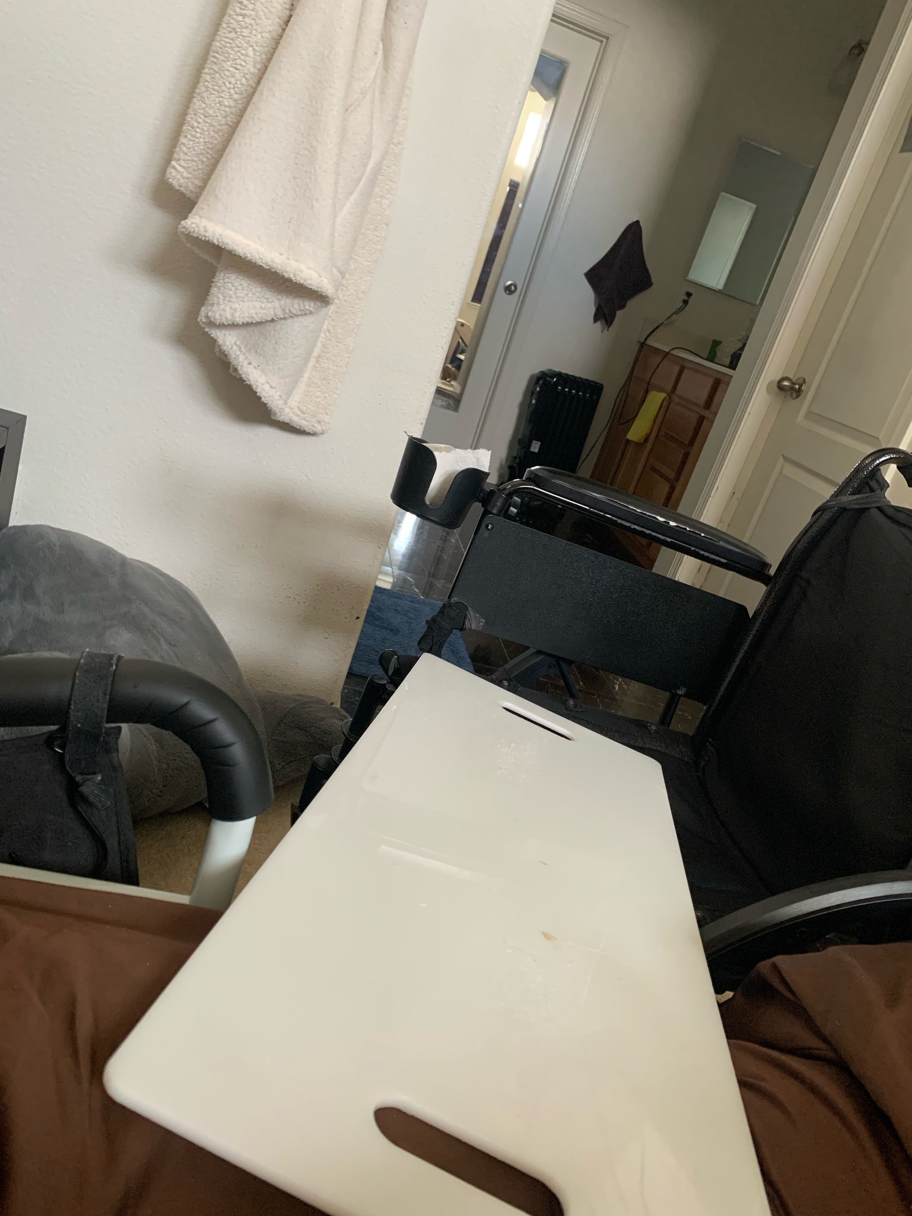 The board I use to get to bed  from the wheelchair 