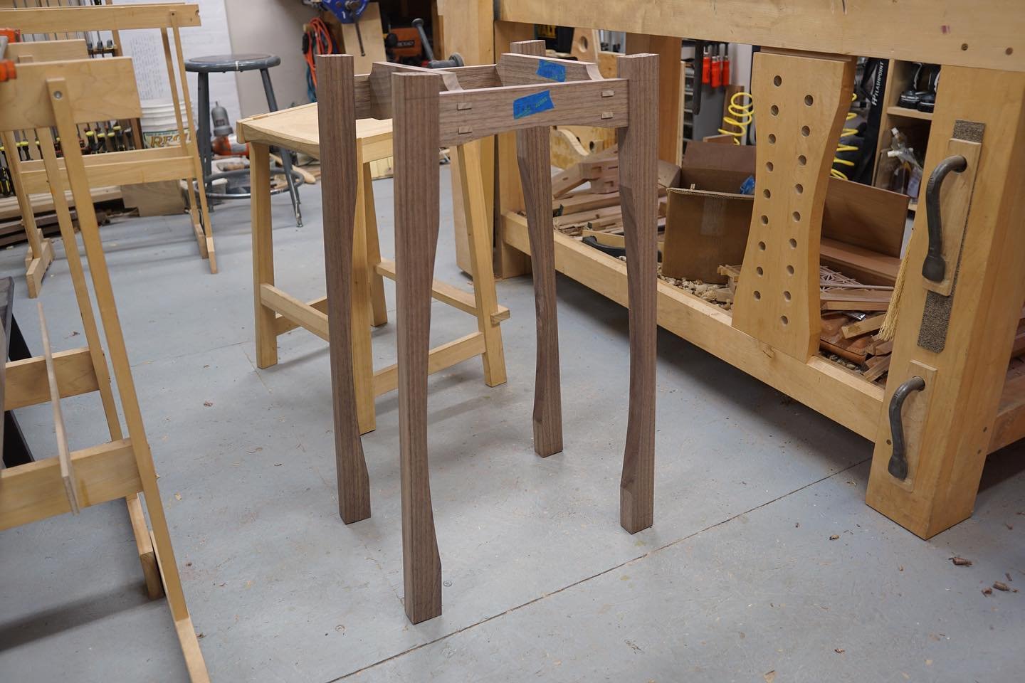 Dry fit of the joinery for the stand. The legs need a little more finessing. The last photo is the brass tabs that will attach the cabinet to the stand.

#walnutcabinetonastandbuild #customfurnituremaker #handmadefurniture #customfurniture #furniture