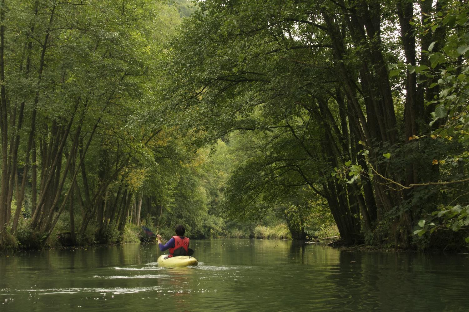  Paddling down the Wiesent River while climbing in Frankenjura, Germany 