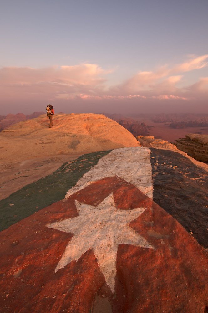 The flag of Jordan painted on the summit of Jebel Rum