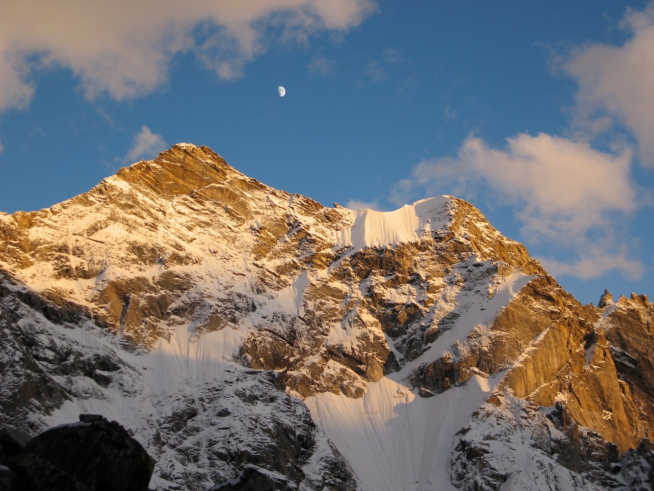 Moonrise over the snow-clad peaks across from our glacier camp