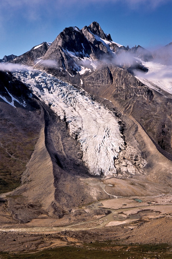  A glacier spills down into the Tasiilap Kuua Valley 