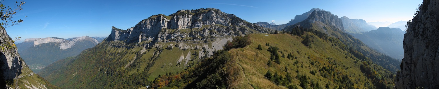 The Col des Frettes - the launch site is the grassy slope facing to the right with a paraglider laid out just visible