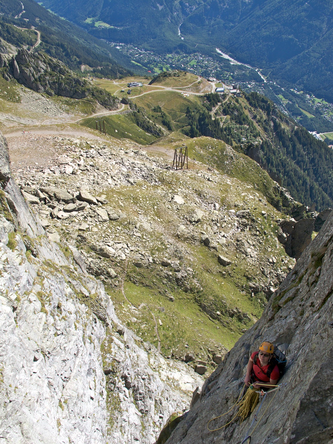  Climbing the Brévent in Chamonix. There is a paragliding launch behind 