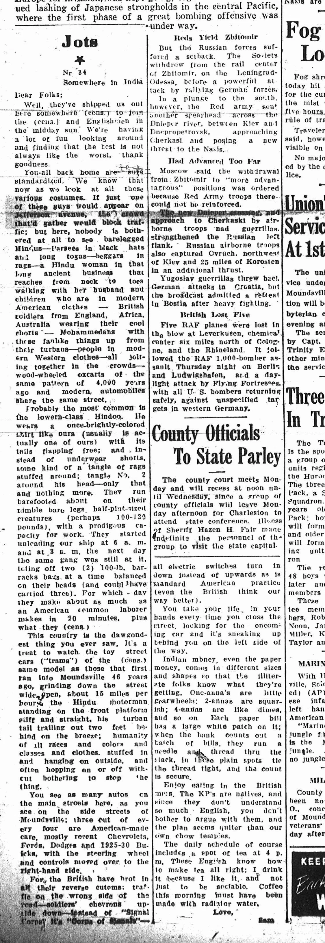 A black and white newspaper page with columns of text discussing World War I events and other topics, including reports on Russian and German military actions, British aircraft losses, and a note about county officials. The page features various headlines and dense paragraph-style writing.