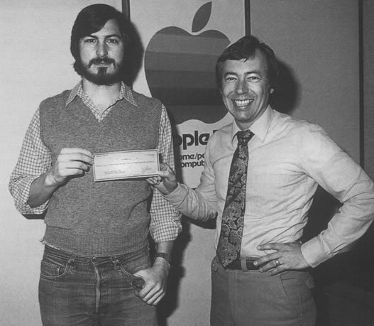 Apple founder Steve Jobs (L) and early investor Mike Markkula (R)