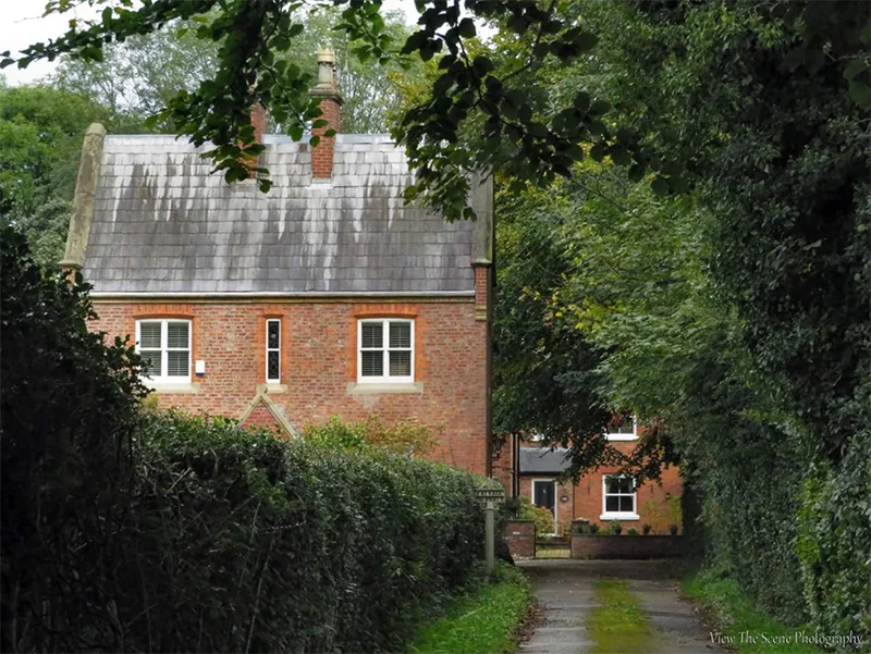 AFTER: Much more careful composition, using leading lines, framing, and a beautiful echo of the front house behind.