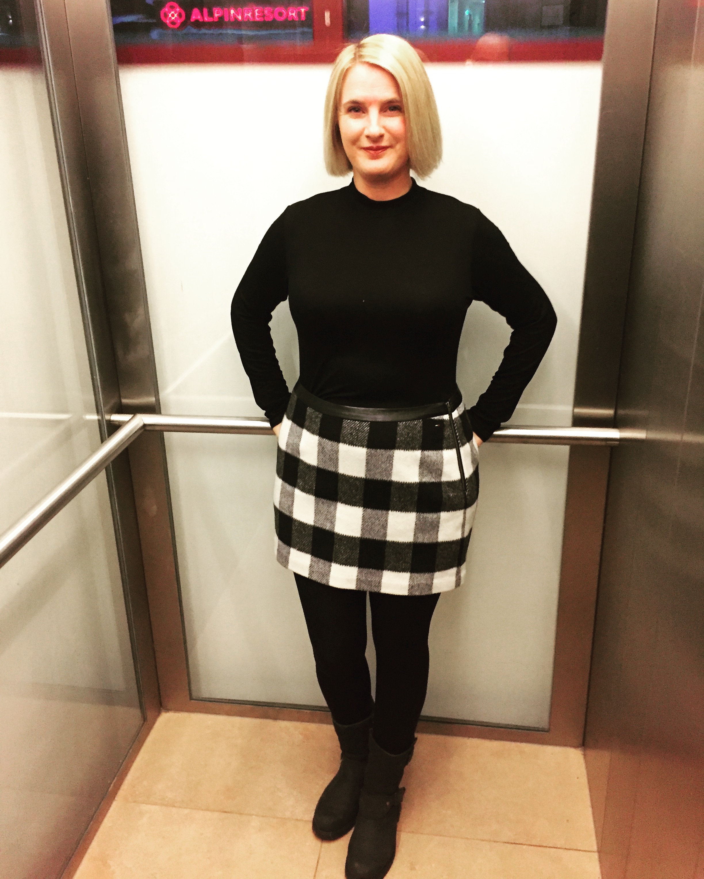 Top from Marks and Spencer, Skirt from Tommy Hilfiger, thick tights with a hole cut in from Tesco, Boots from Barbour. 