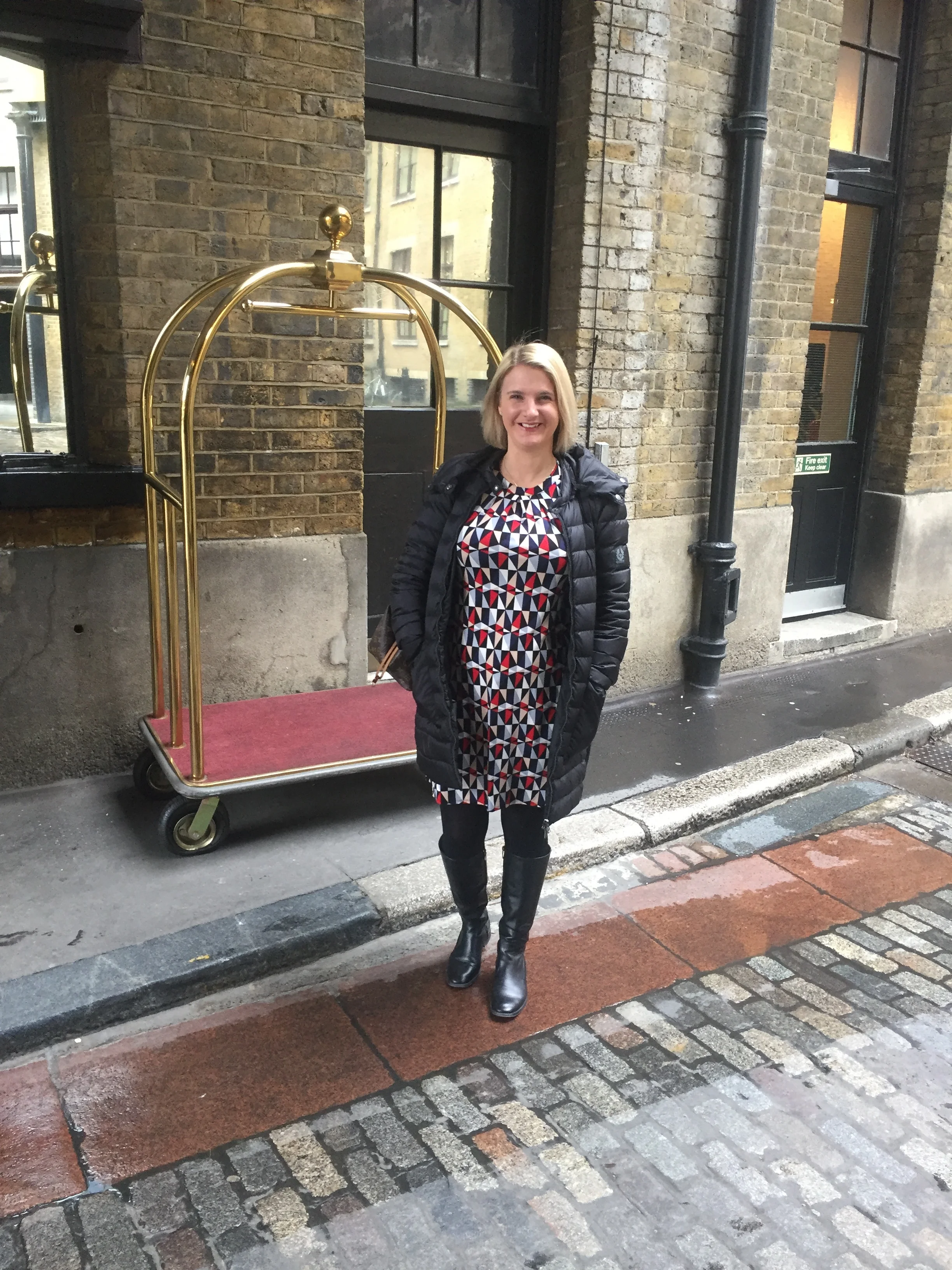 Dress from Dorothy Perkins, Coat from Belstaff, Boots from Hobbs.