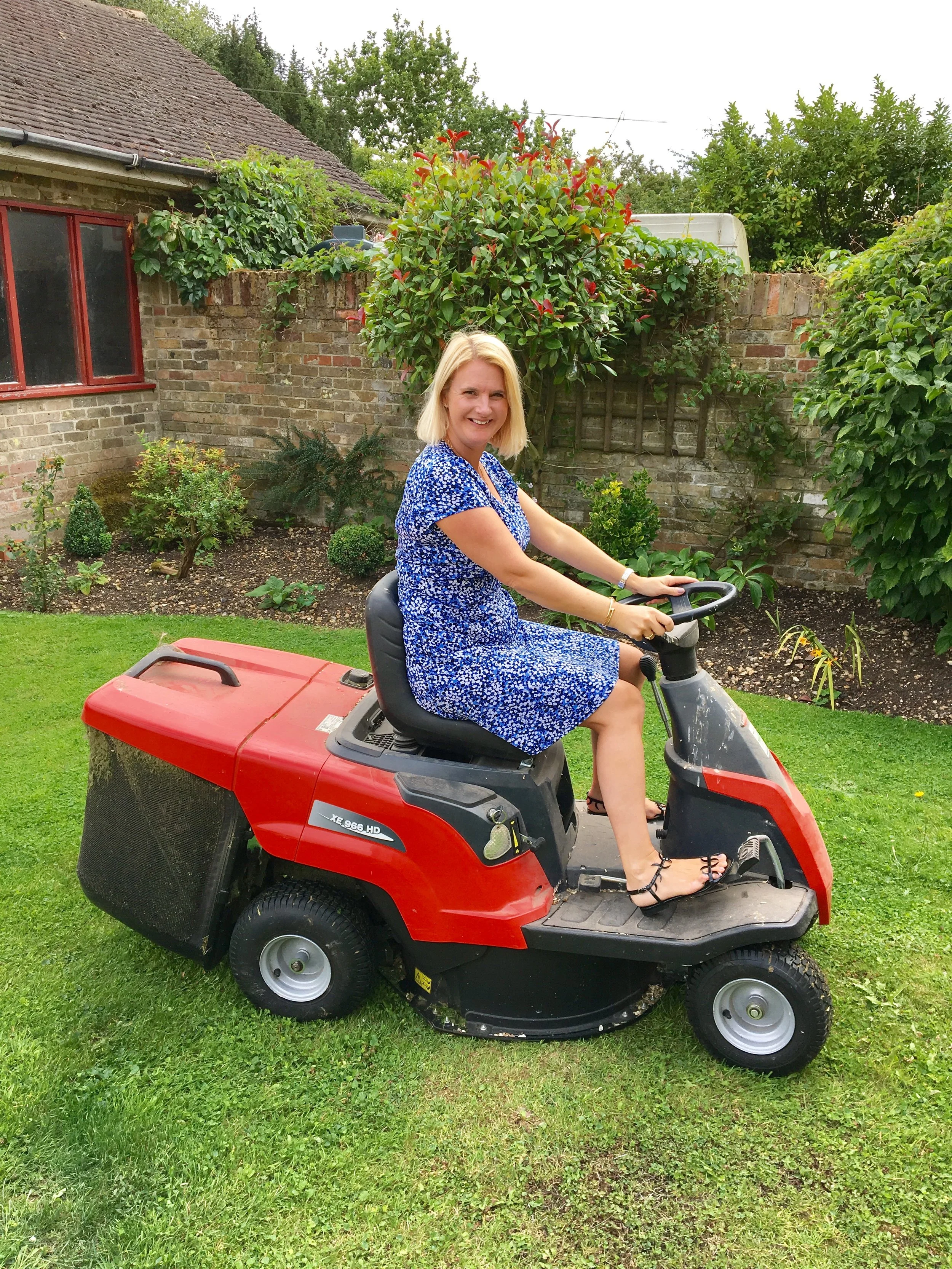 Dress From Micheal Kors, Shoes From Manolo Blahnik, Mower for my birthday last year, C knows how to treat a lady! Hahahahahahah. I'm more Margot from The Good Life than Barbara when it comes to gardening, but at least I get it done. 