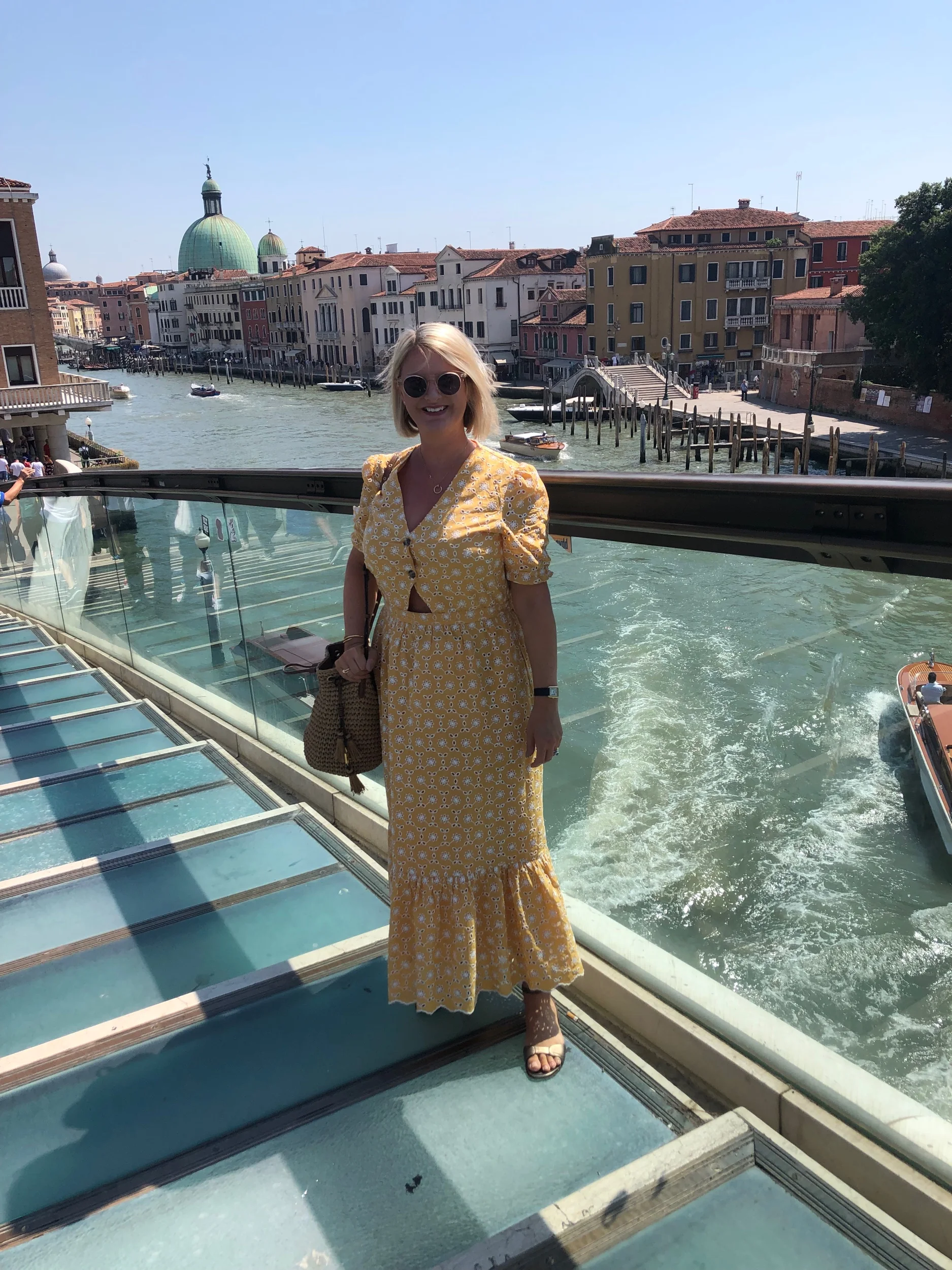 Straight off the bus and striking a pose by the Grand Canal.