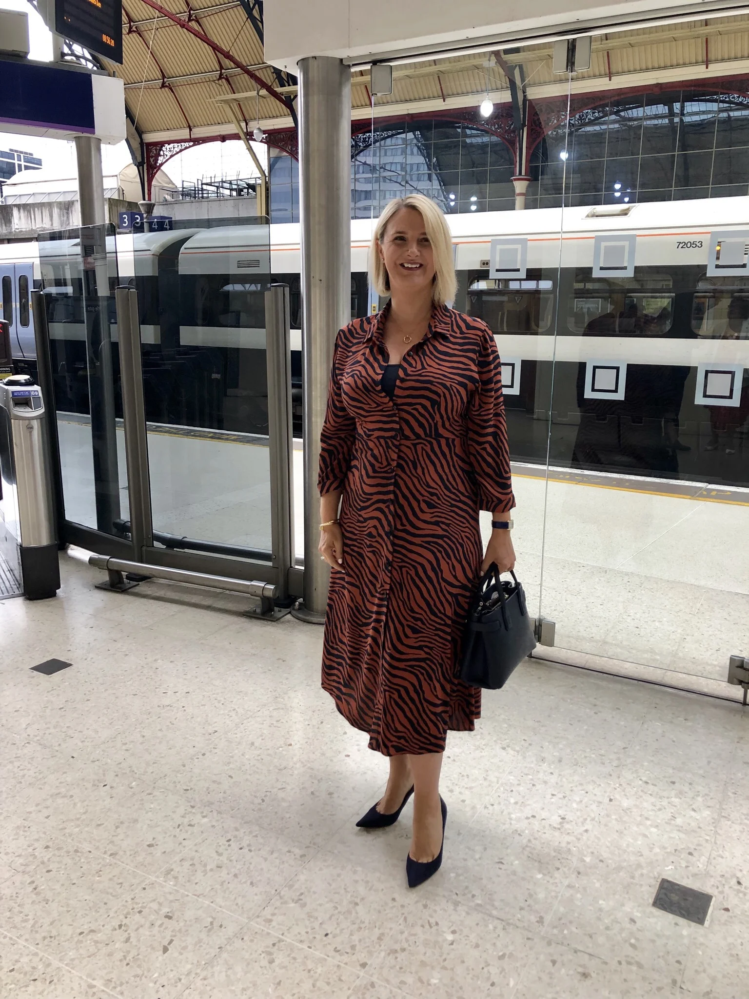 Dress from Primark, vest top from M&S, Shoes from Jimmy Choo, Bag from Burberry.