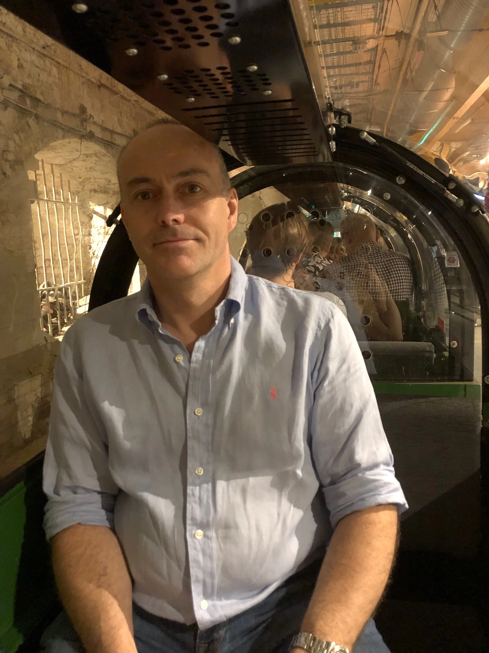 Inside the tiny tube trains that now serve this tunnel.