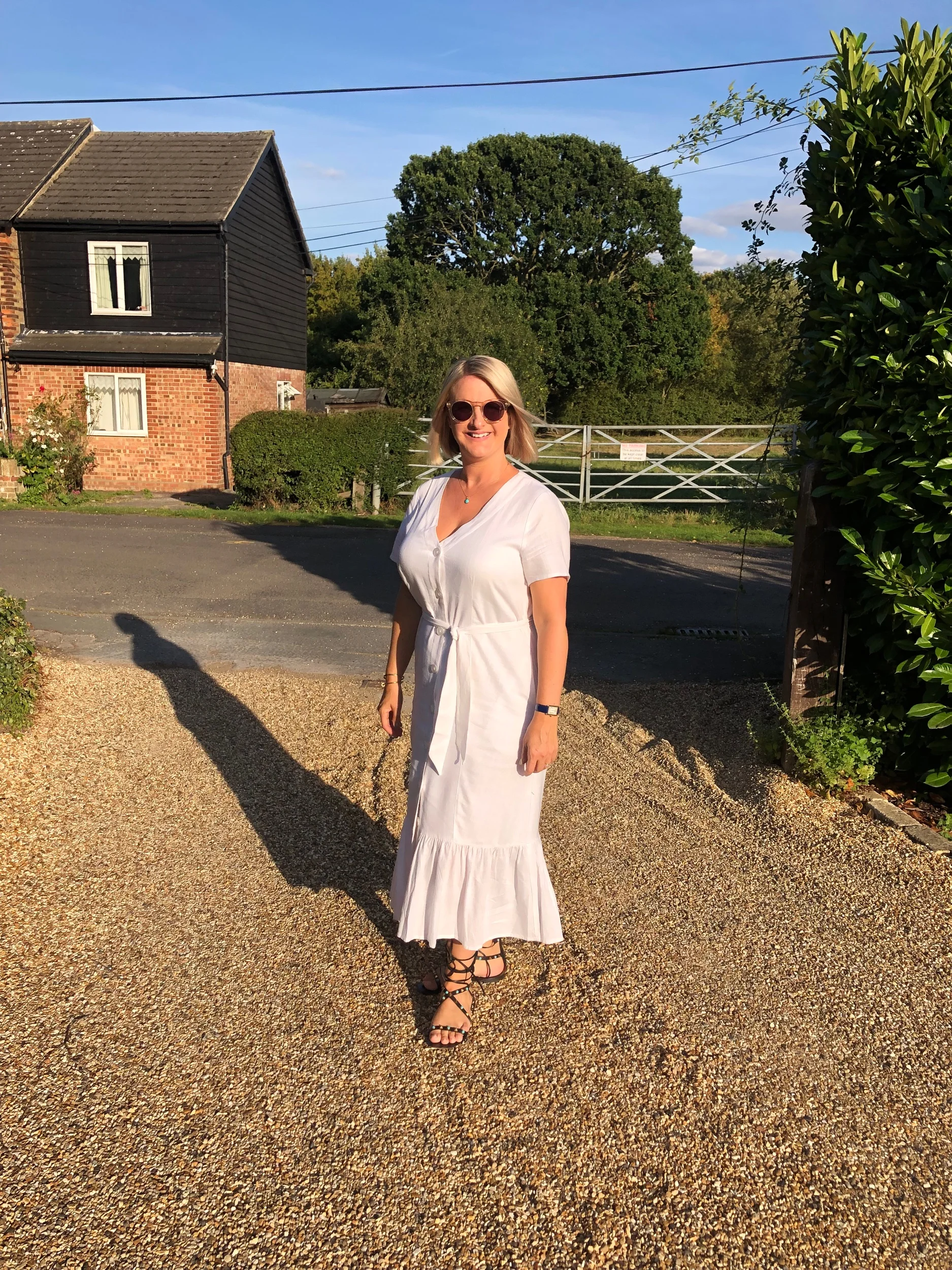 Dress from Oliver Bonas, Shoes Valentino Rockstuds, bag from Armani.
