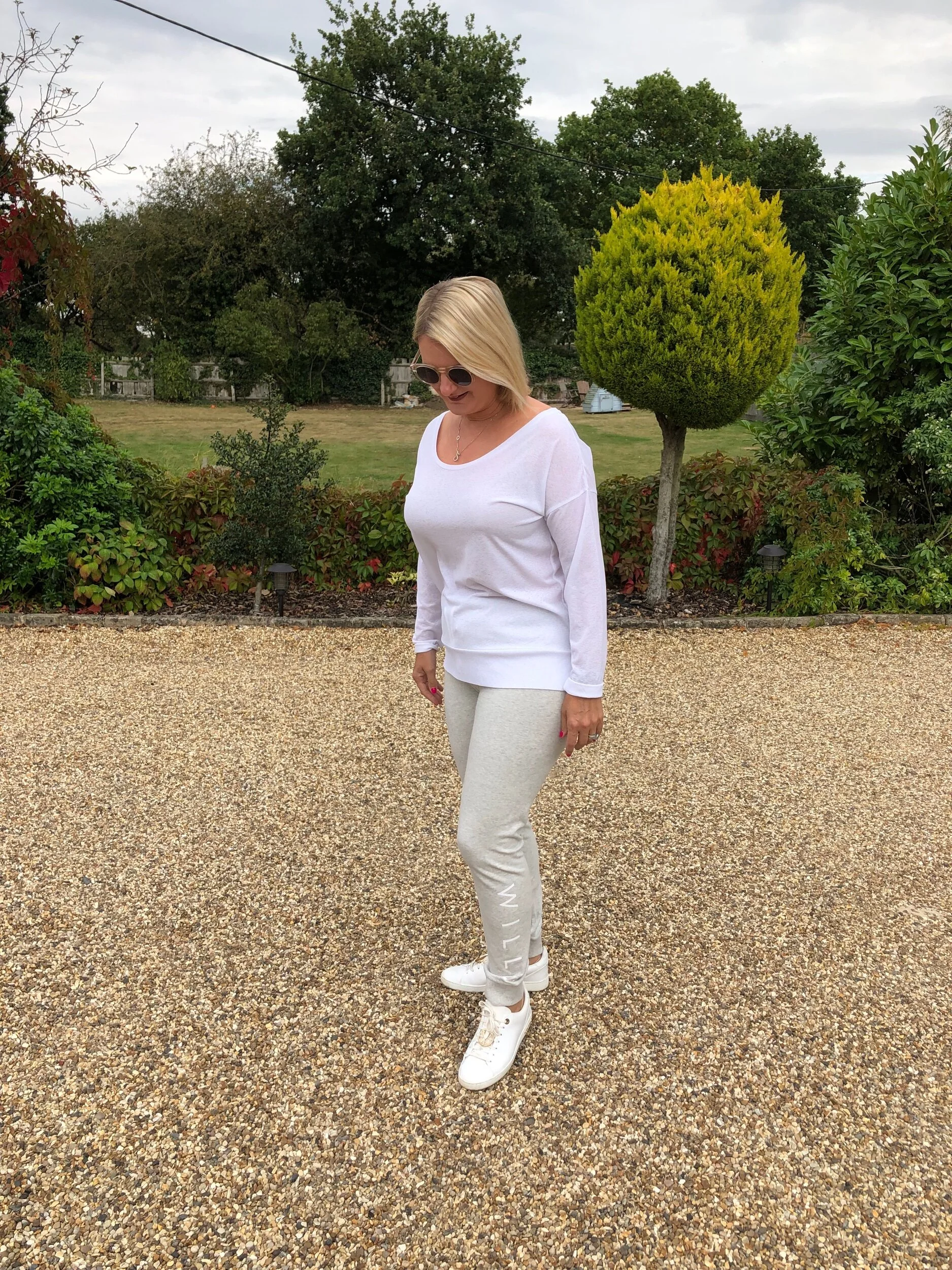 Top from Next, Joggers from Jack Wills, Trainers from Louis Vuitton.