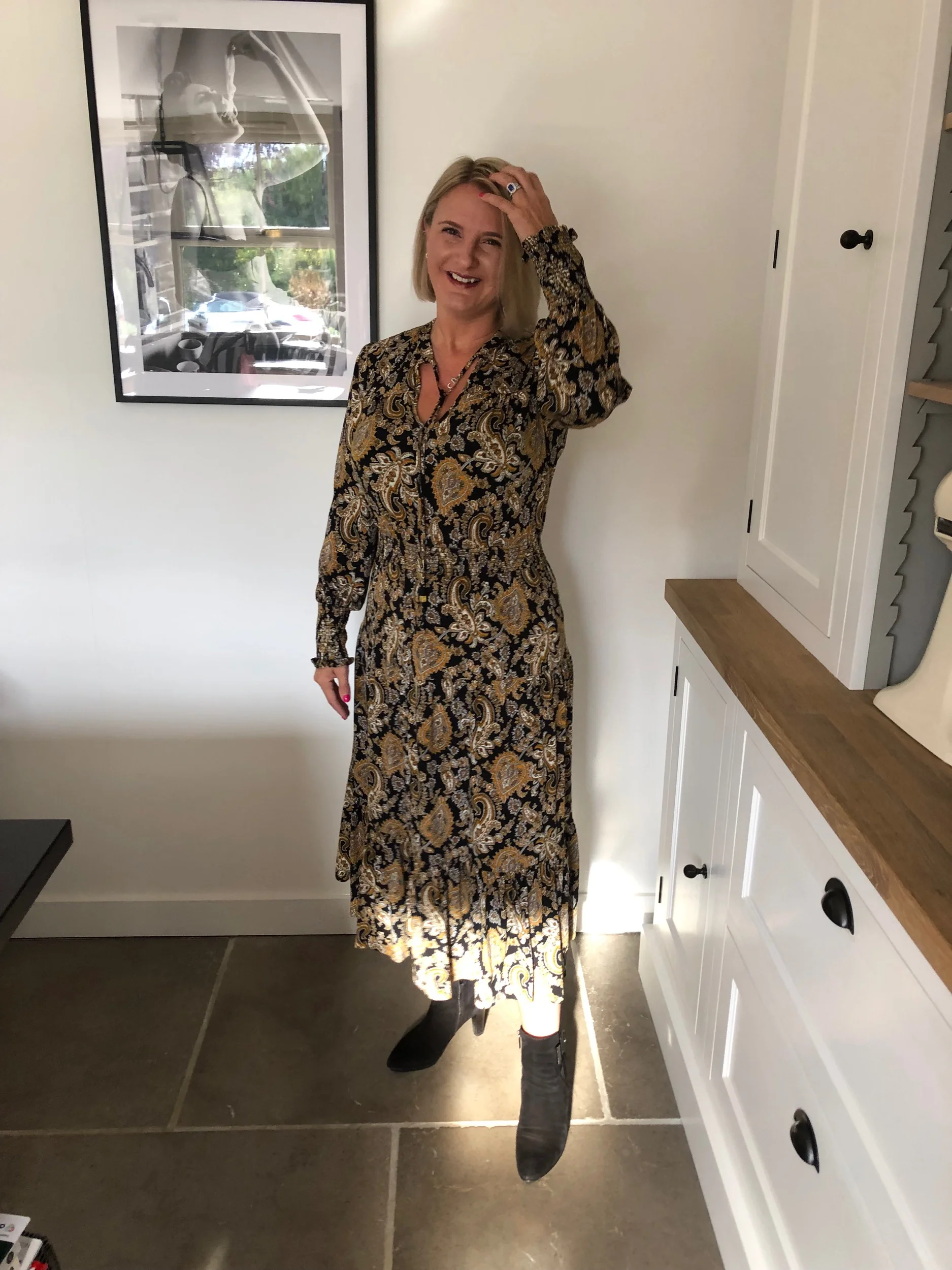 Dress from Michael Kors, Boots from Russell & Bromley.