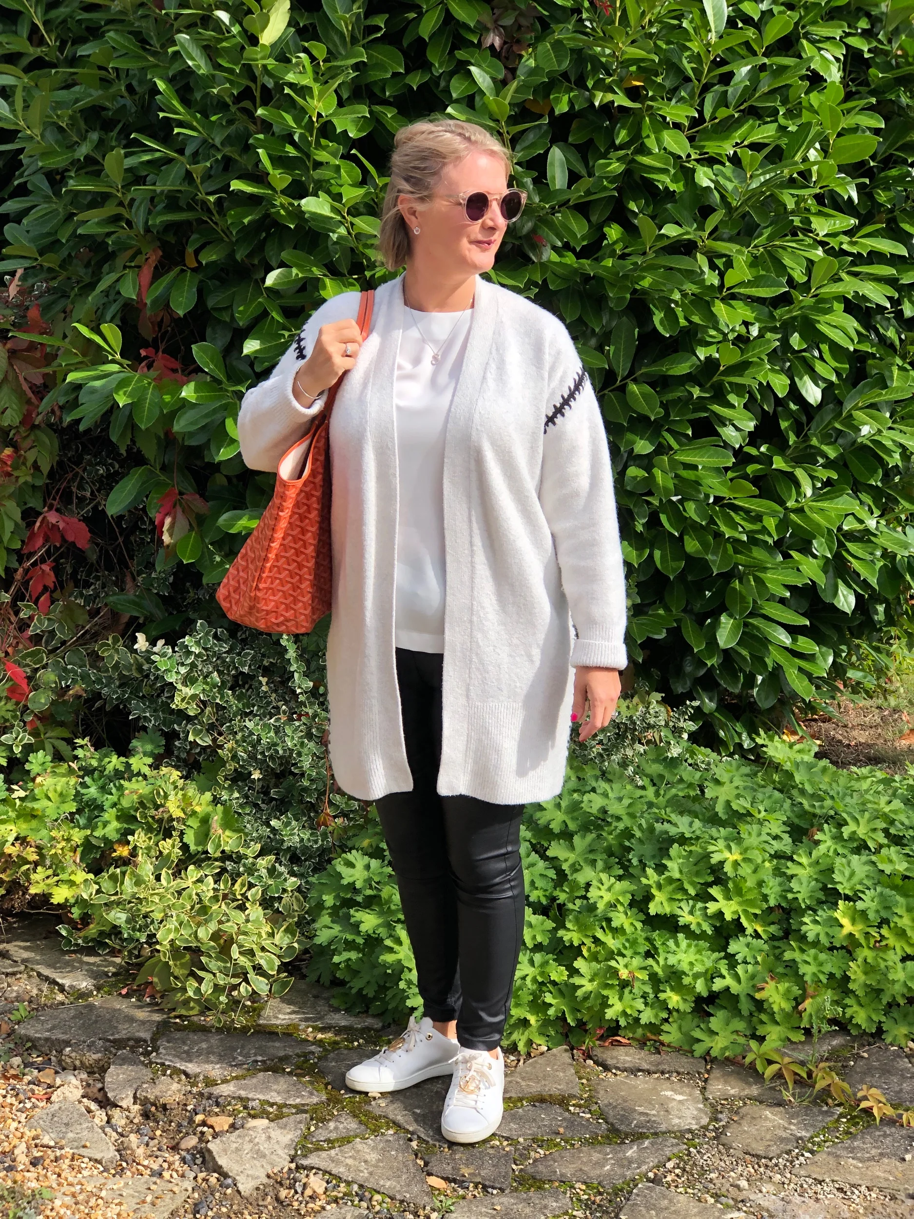 Top from Tommy Hilfiger, Jeggings from Next, Cardigan from The White Company, Shoes from Louis Vuitton, Bag from Goyard.