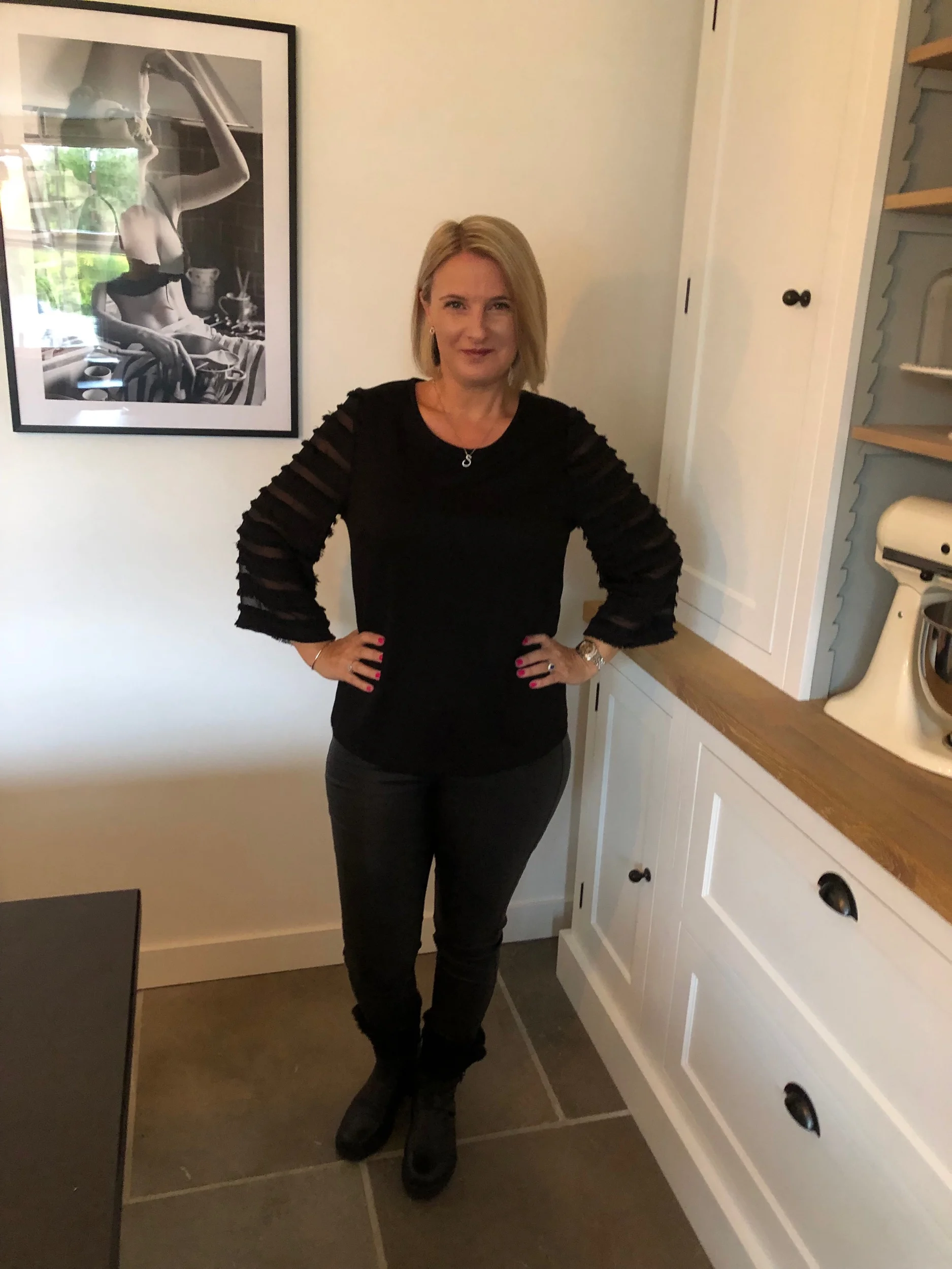 Top from Sainsbury’s, Leggings from Next, Boots from Kurt Geiger.