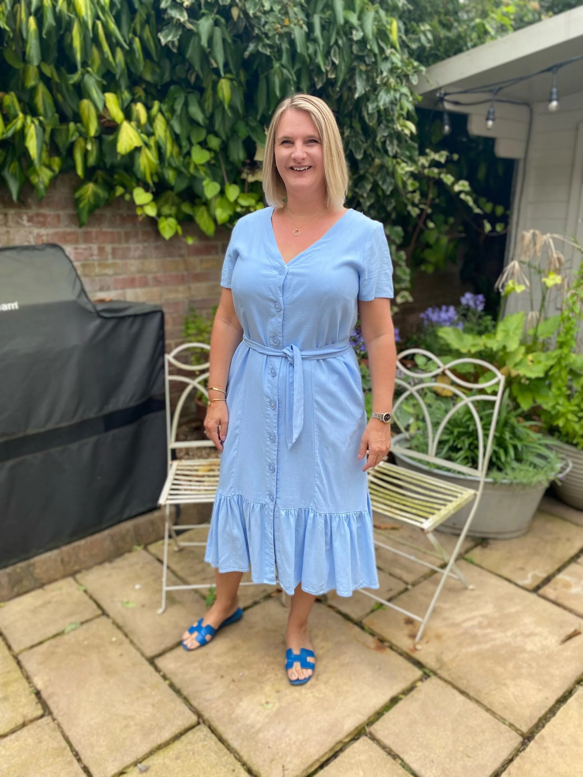 Dress from Oliver Bonas, Shoes from Hermes.